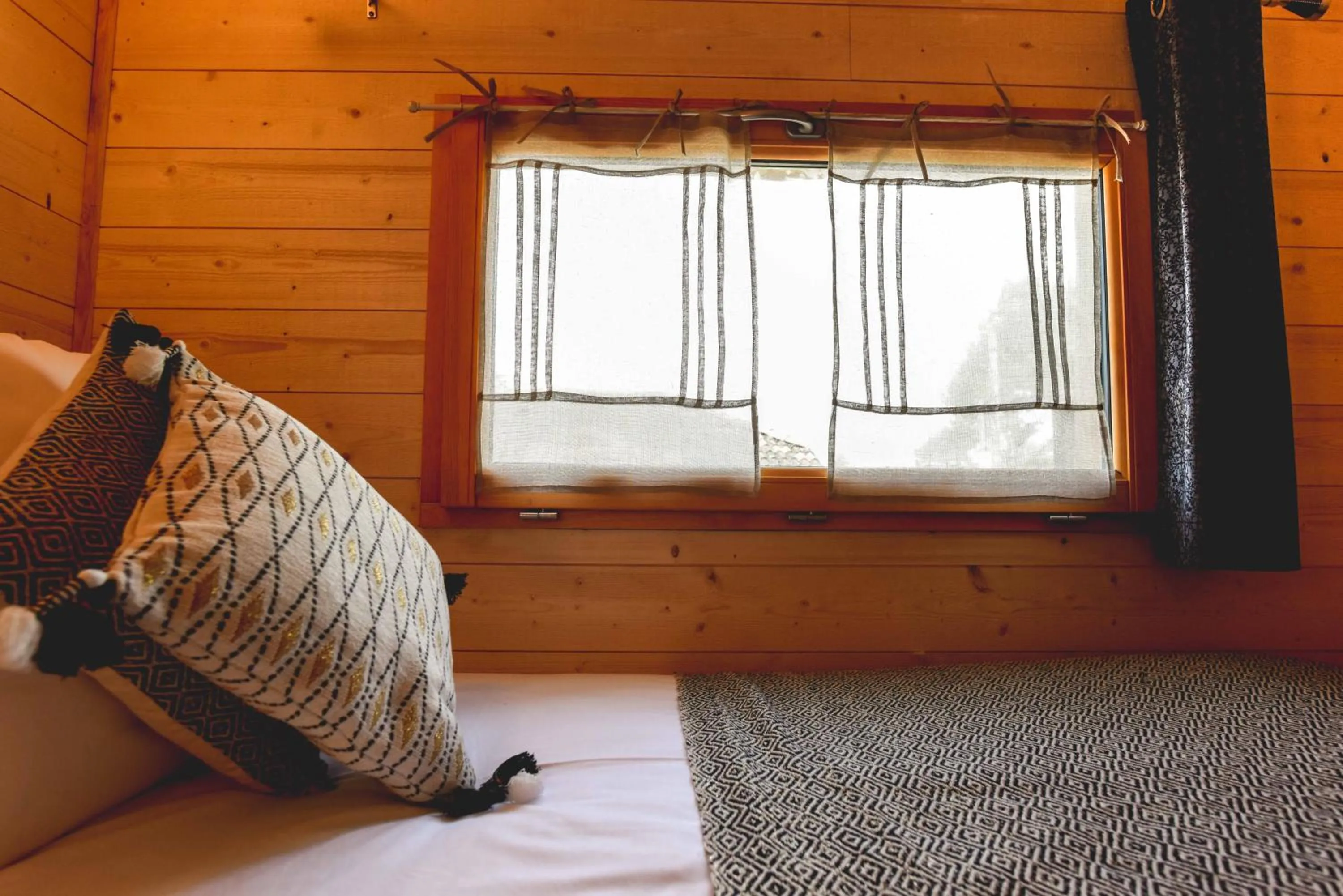 Bed in Logis Hôtel Emeraude des Bois