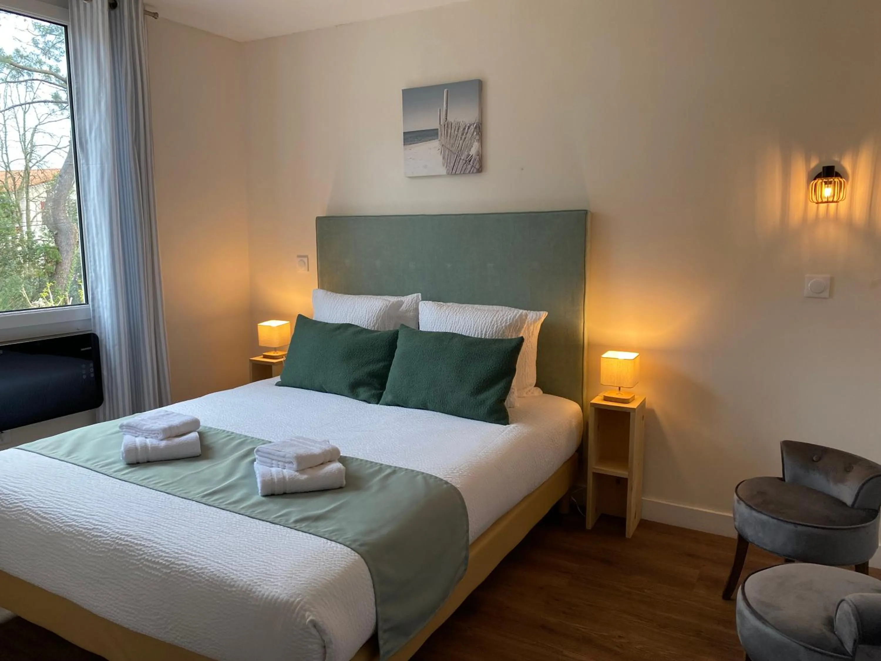 Photo of the whole room, Bed in Logis Hôtel Emeraude des Bois