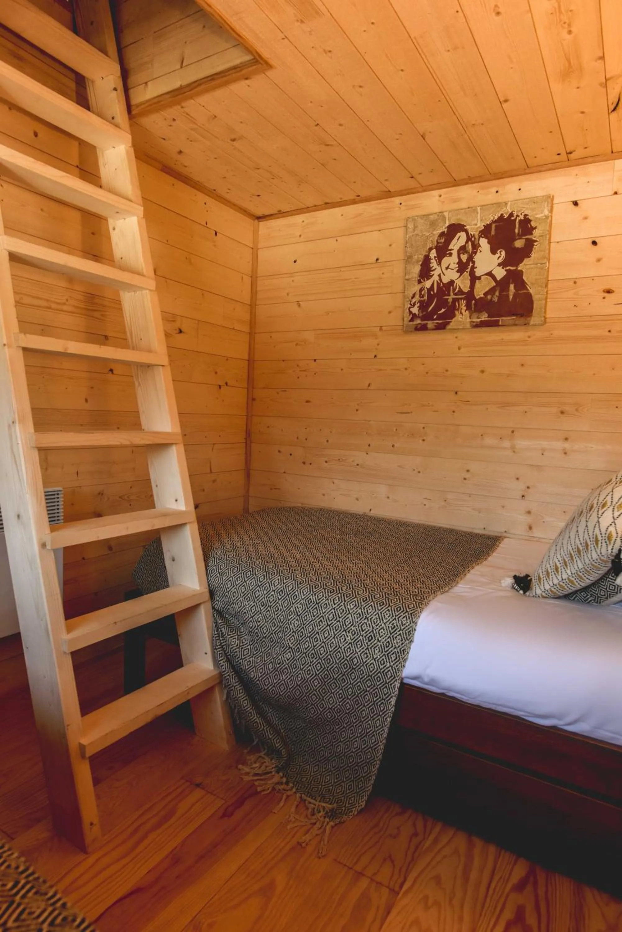 Bed in Logis Hôtel Emeraude des Bois