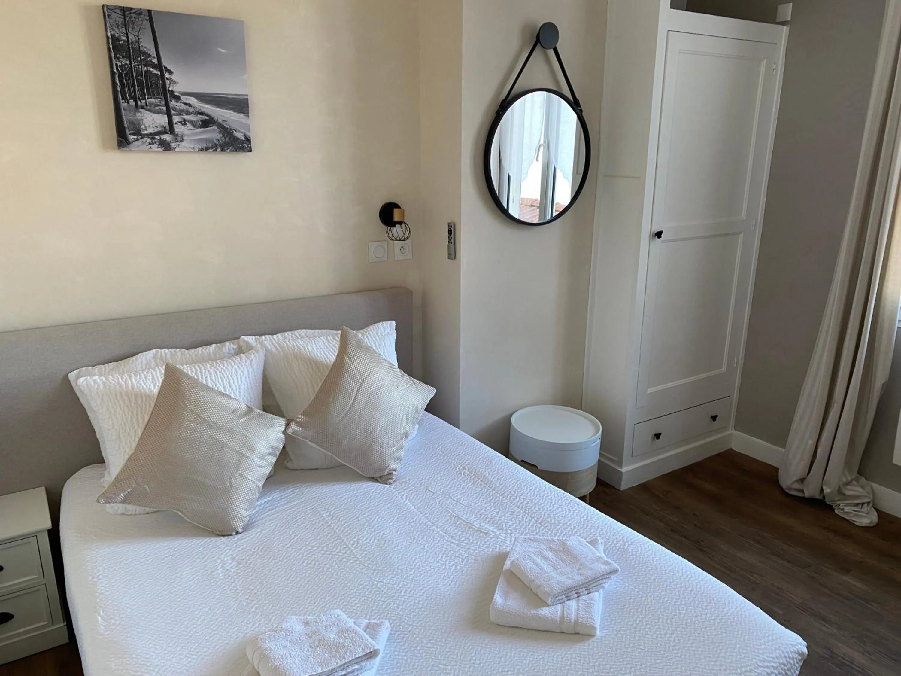 Bed in Logis Hôtel Emeraude des Bois