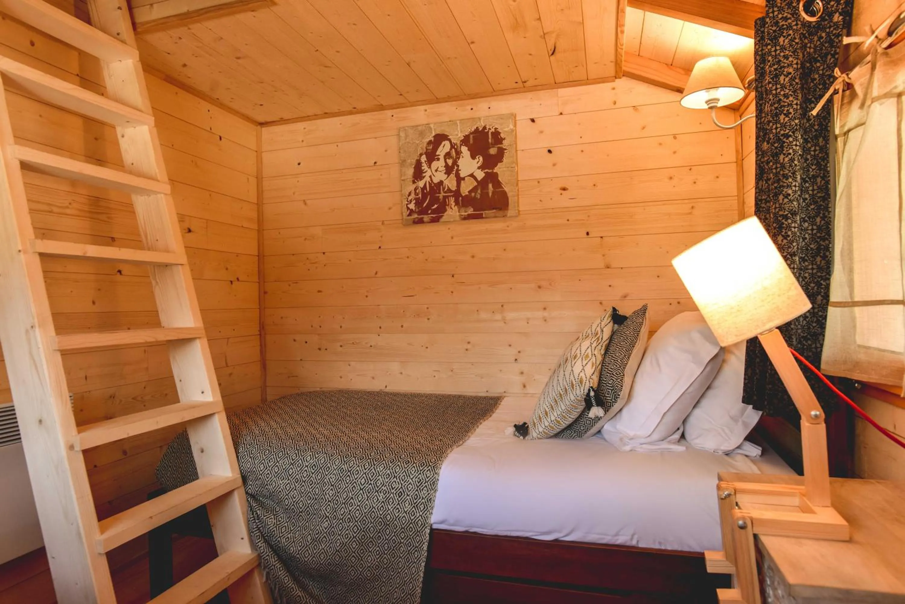 Bed in Logis Hôtel Emeraude des Bois