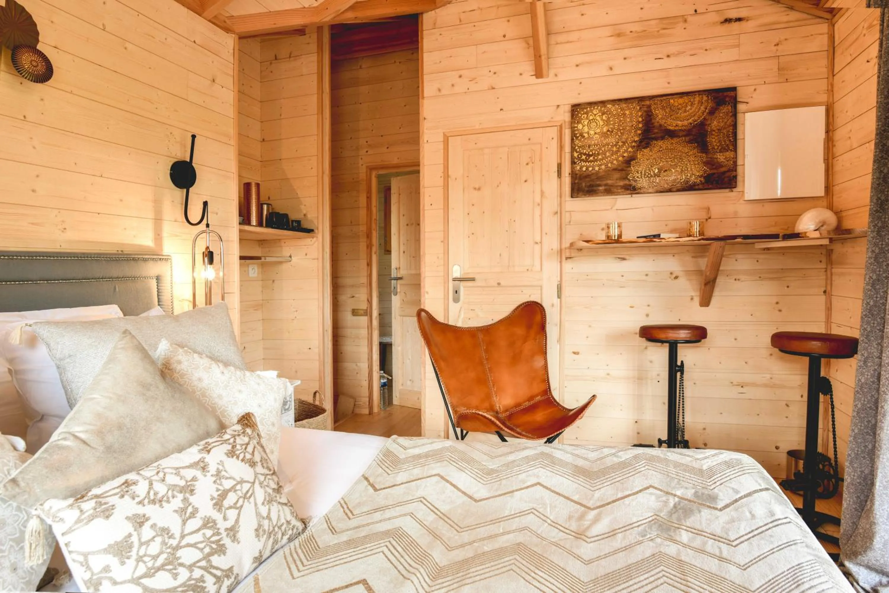 Bed in Logis Hôtel Emeraude des Bois