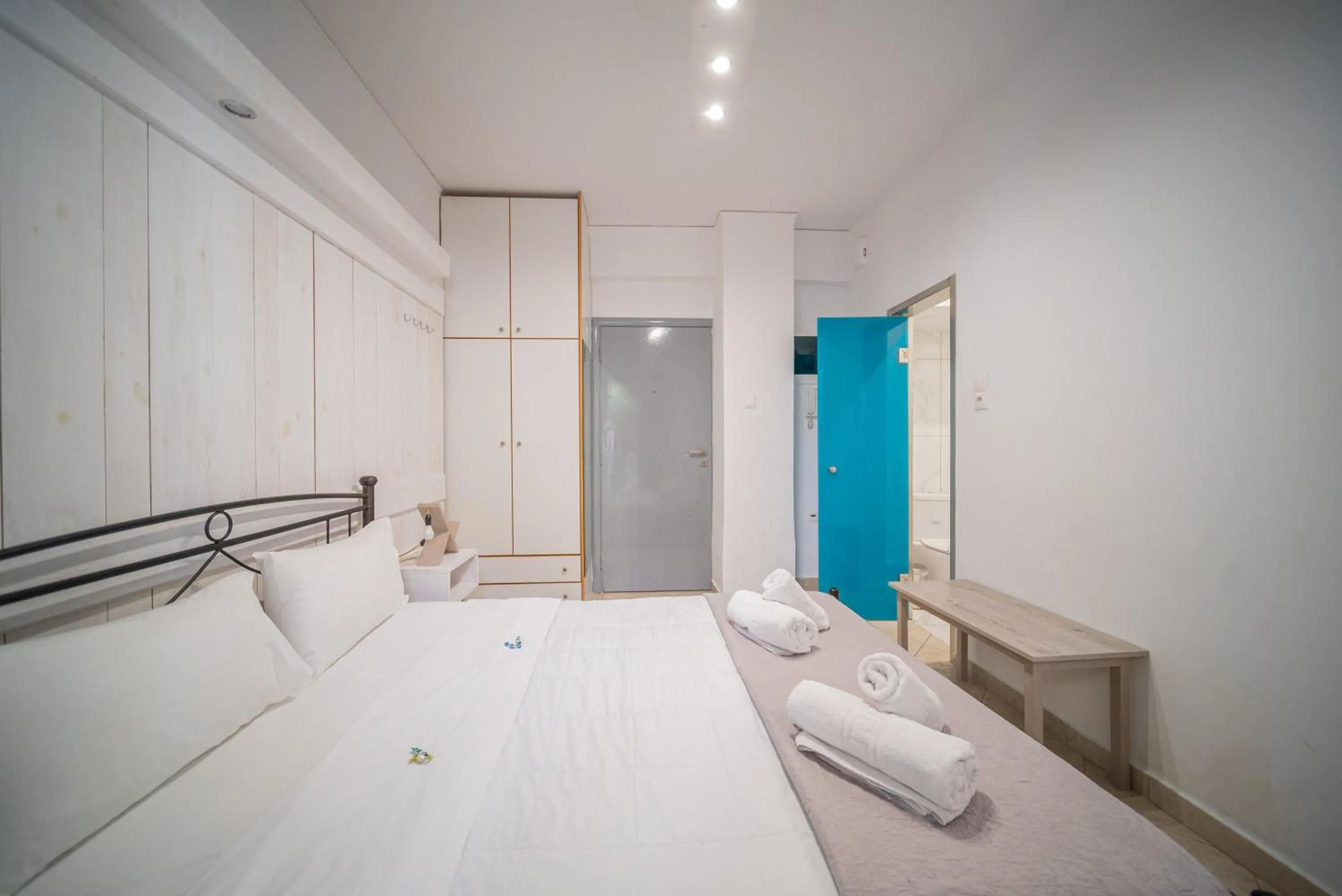Bed in City Center Studios by Cretan Houses