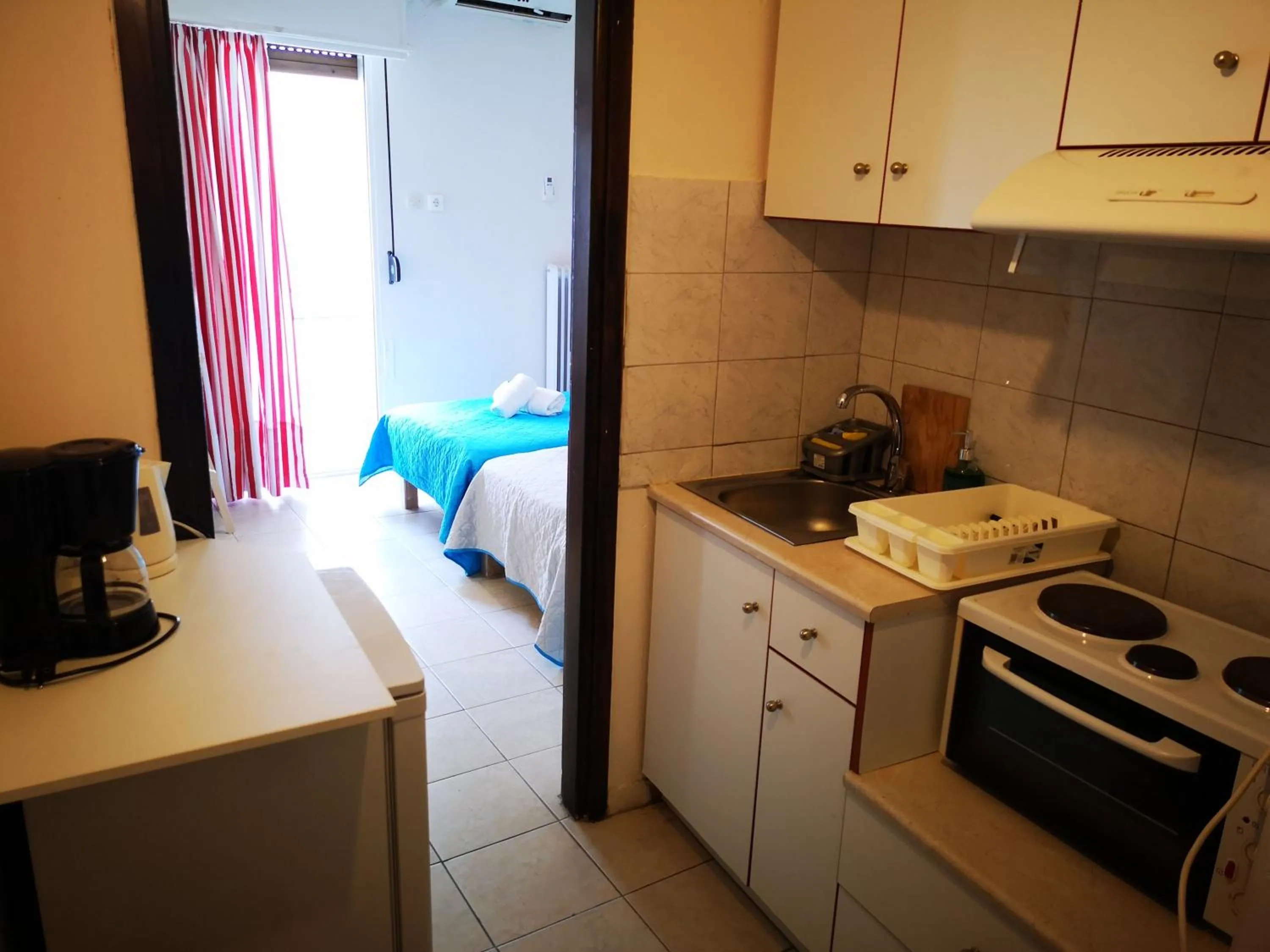 Bed in City Center Studios by Cretan Houses