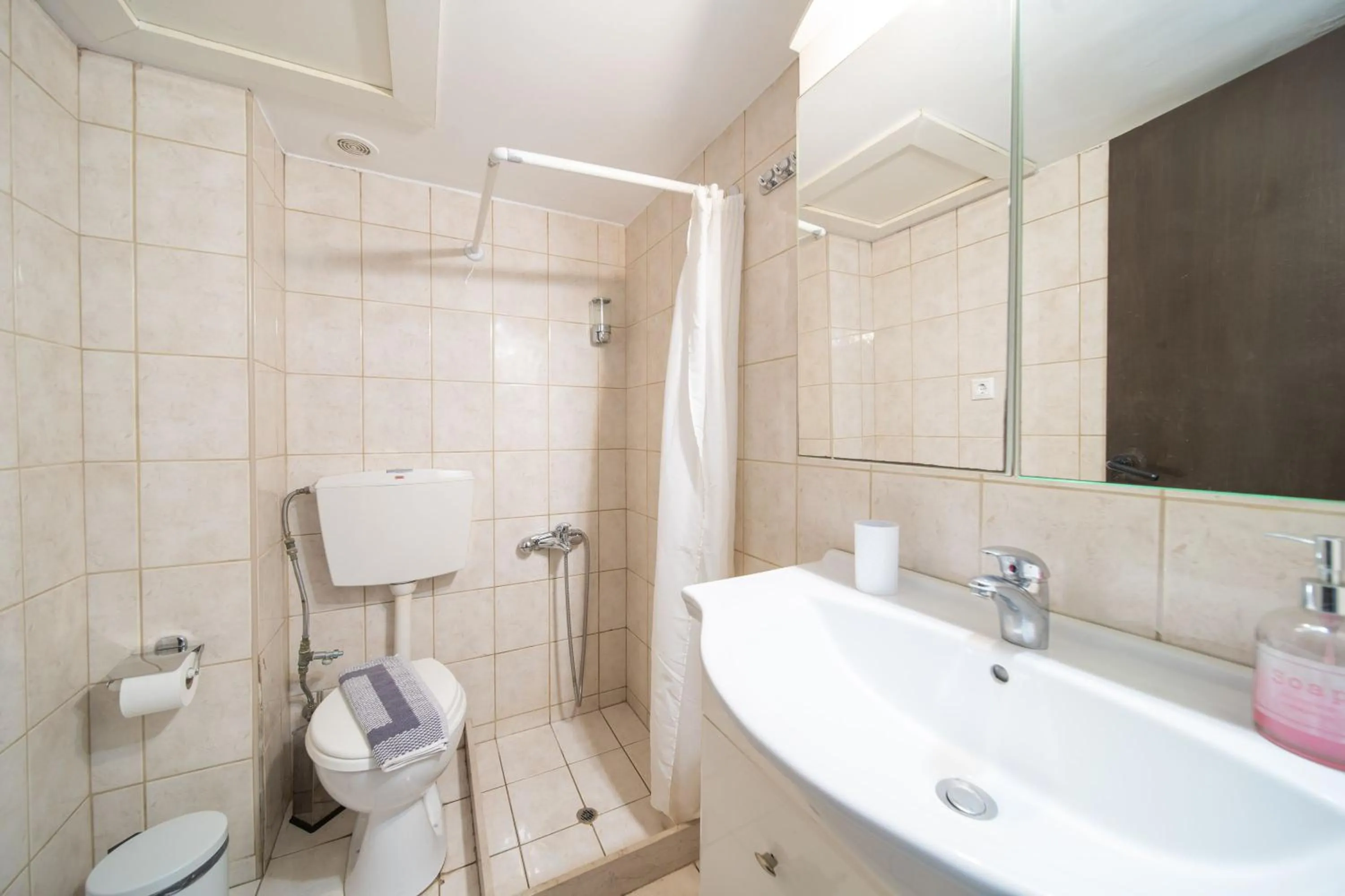 Shower in City Center Studios by Cretan Houses