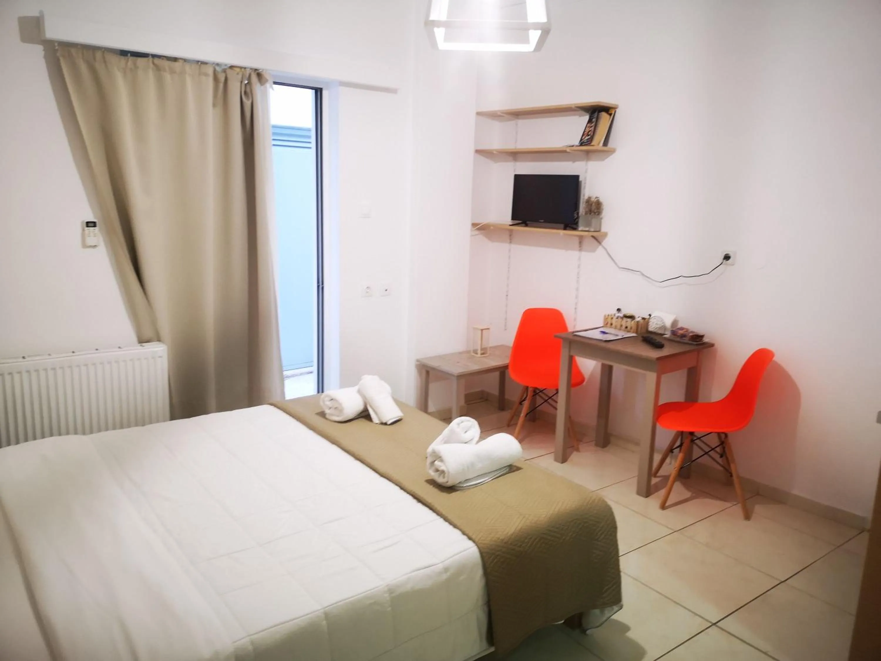 Bed in City Center Studios by Cretan Houses