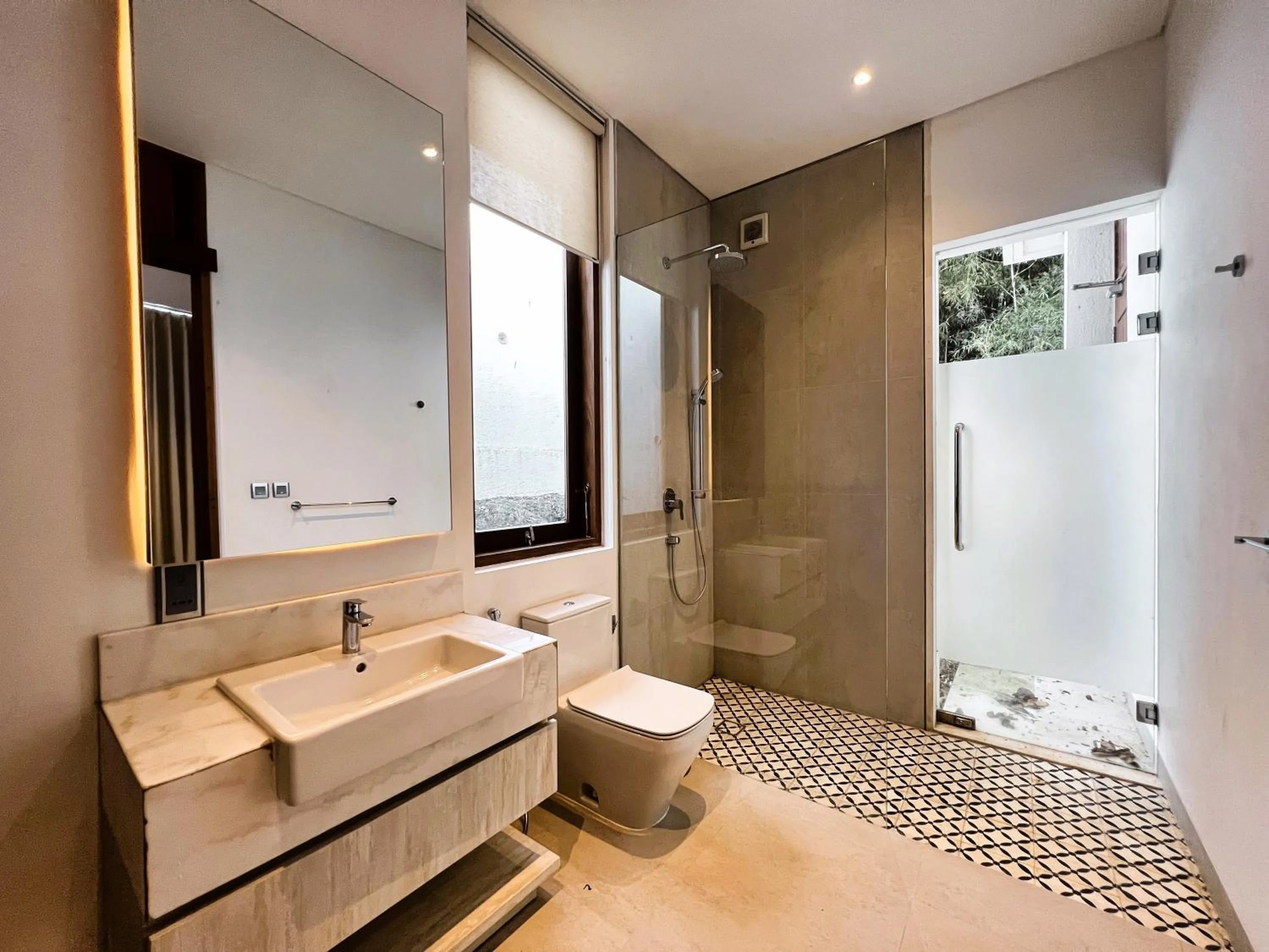 Shower in Selong Selo Resort and Villas