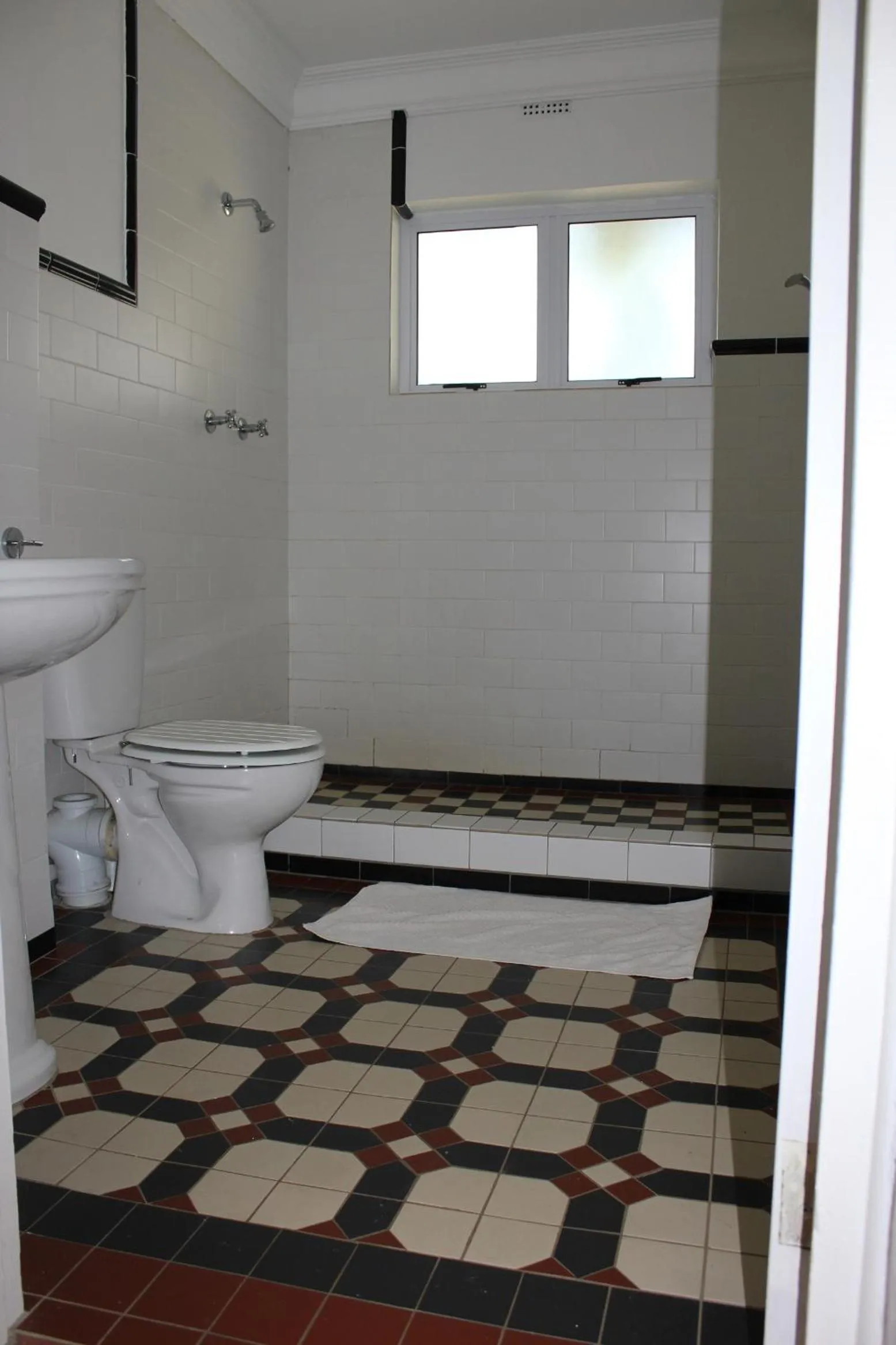 Toilet in Sugar Hill Manor