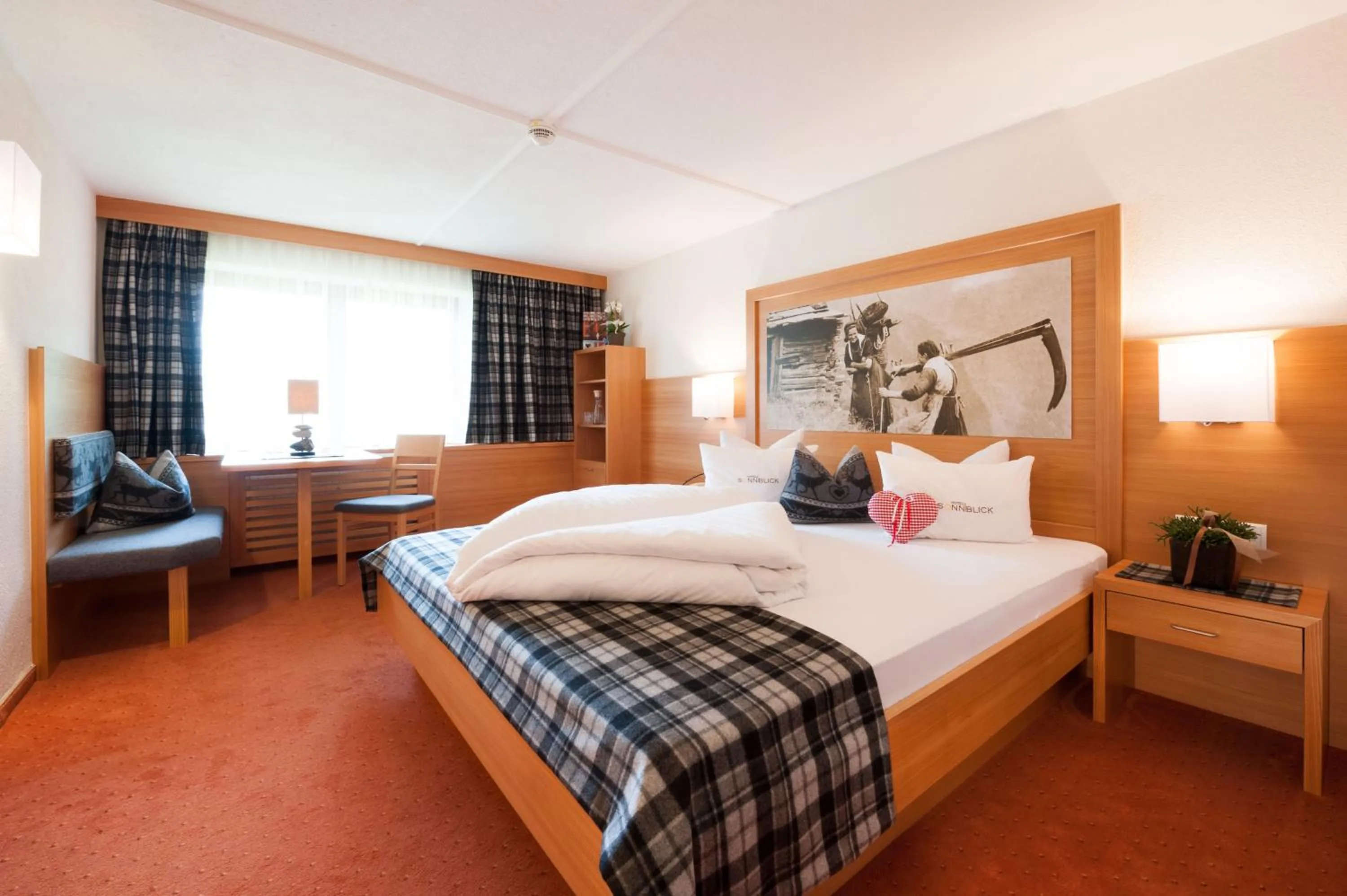 Bed in GenussHotel Sonnblick