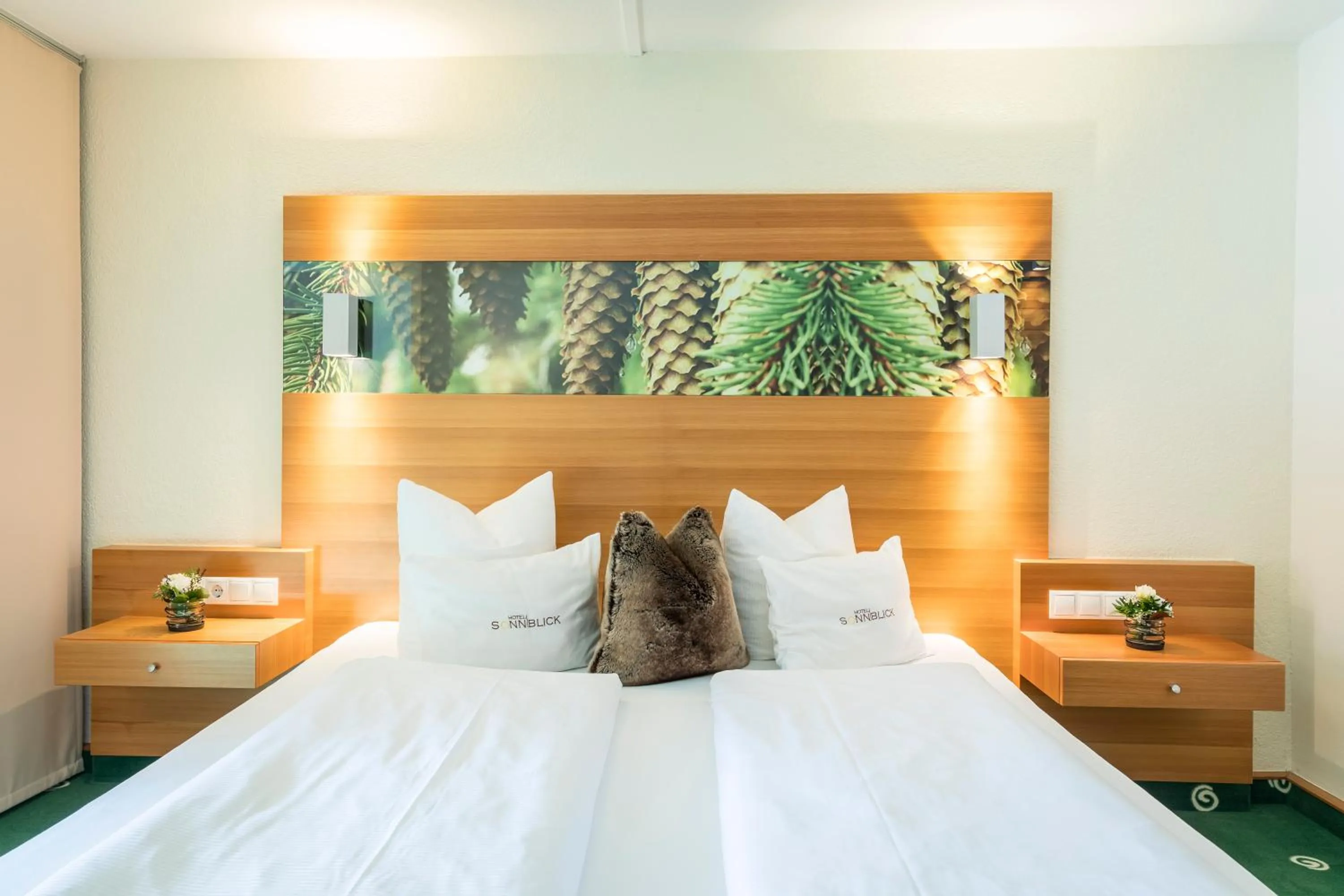 Bed in GenussHotel Sonnblick