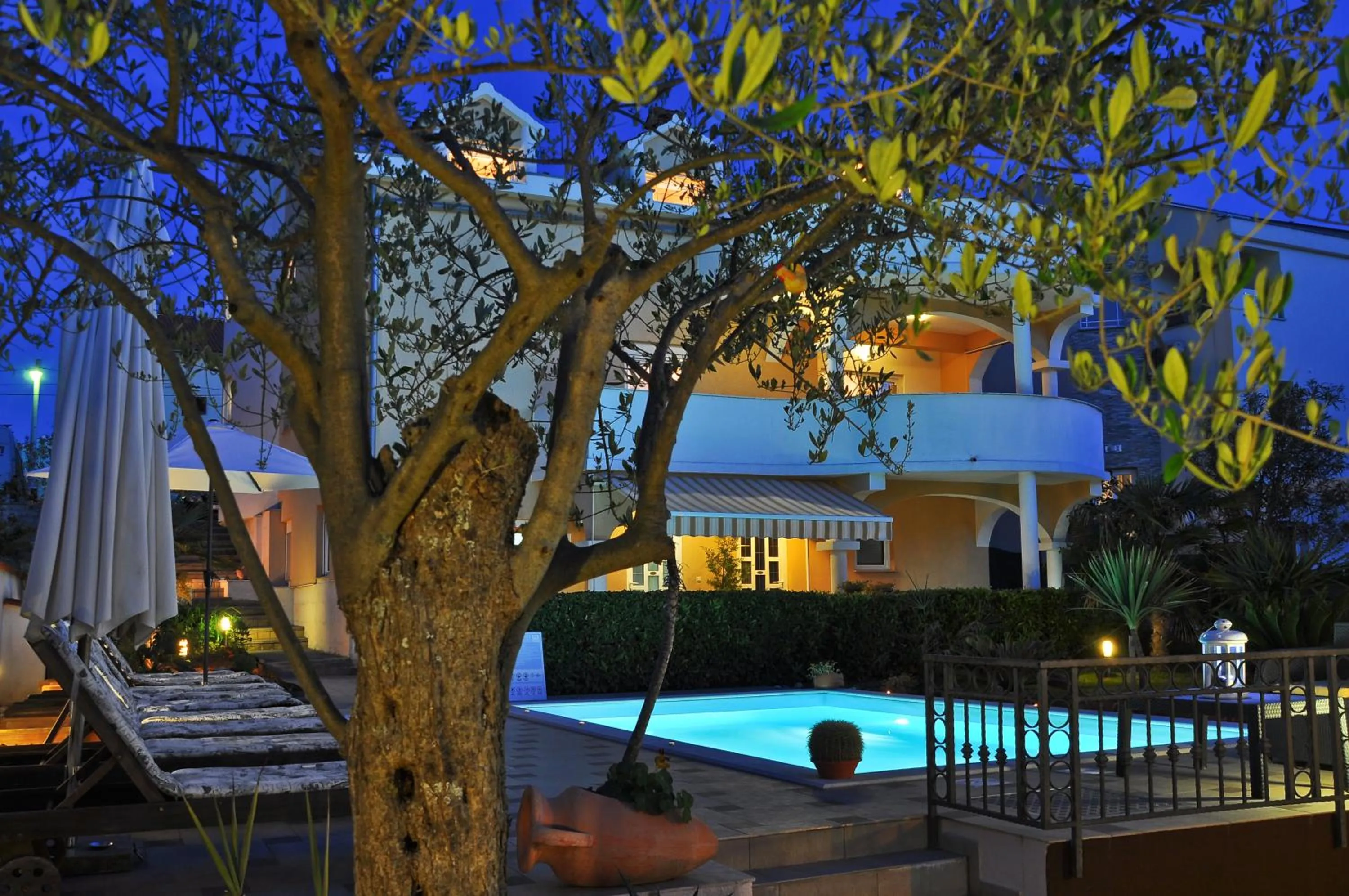 Garden in Villa Vanilla with Heated Pool