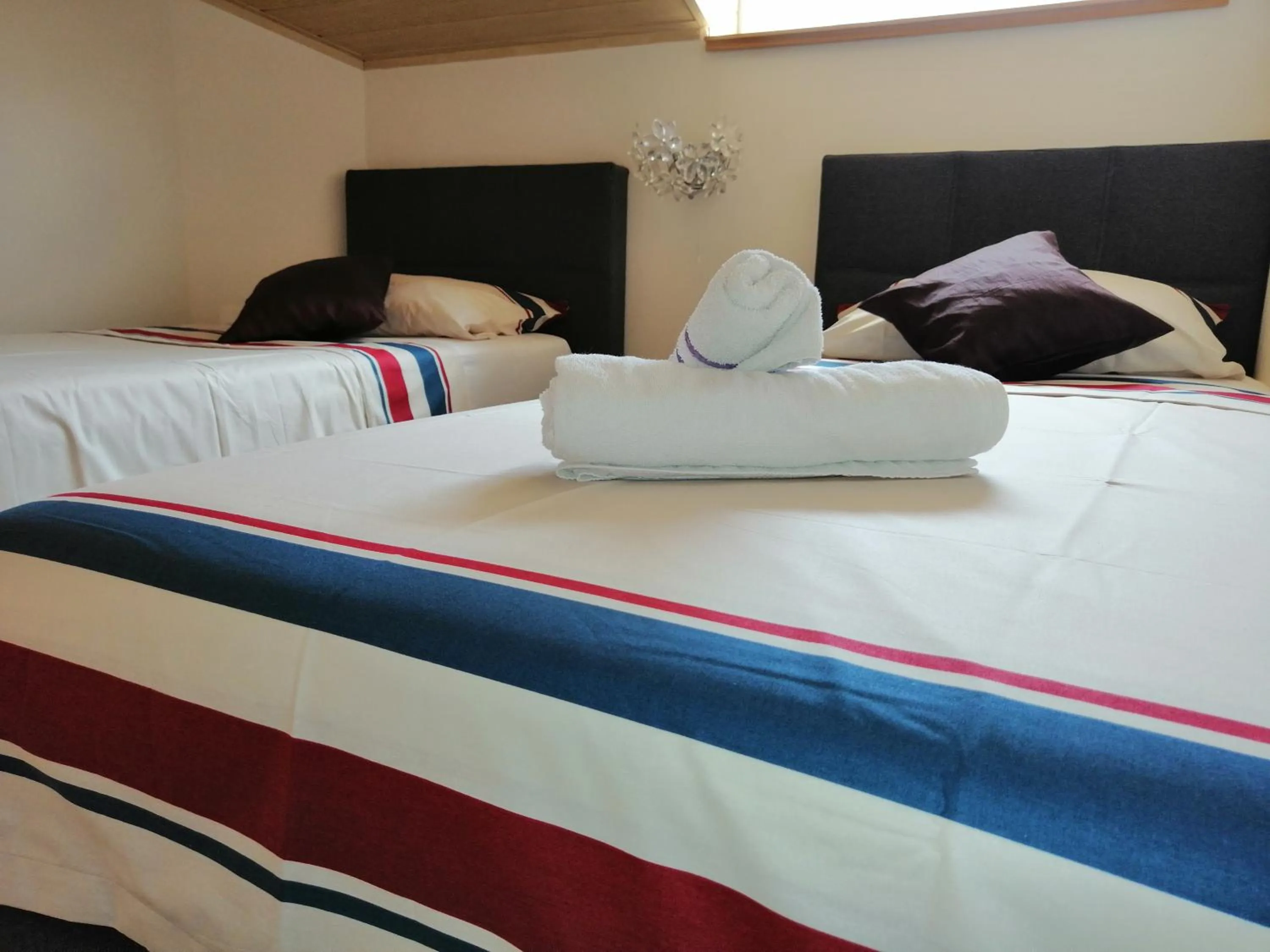 Bed in Villa Vanilla with Heated Pool