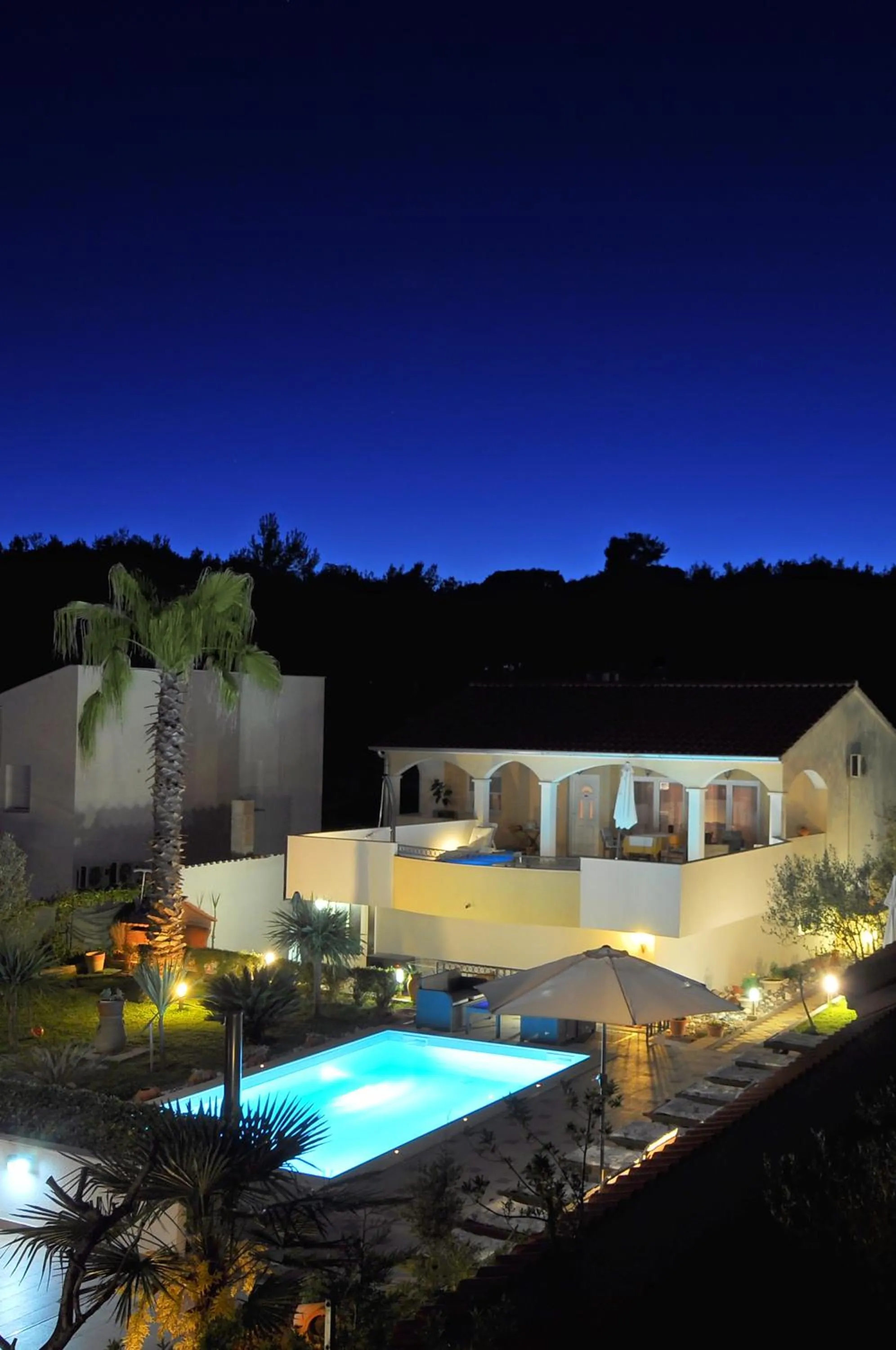 Garden in Villa Vanilla with Heated Pool