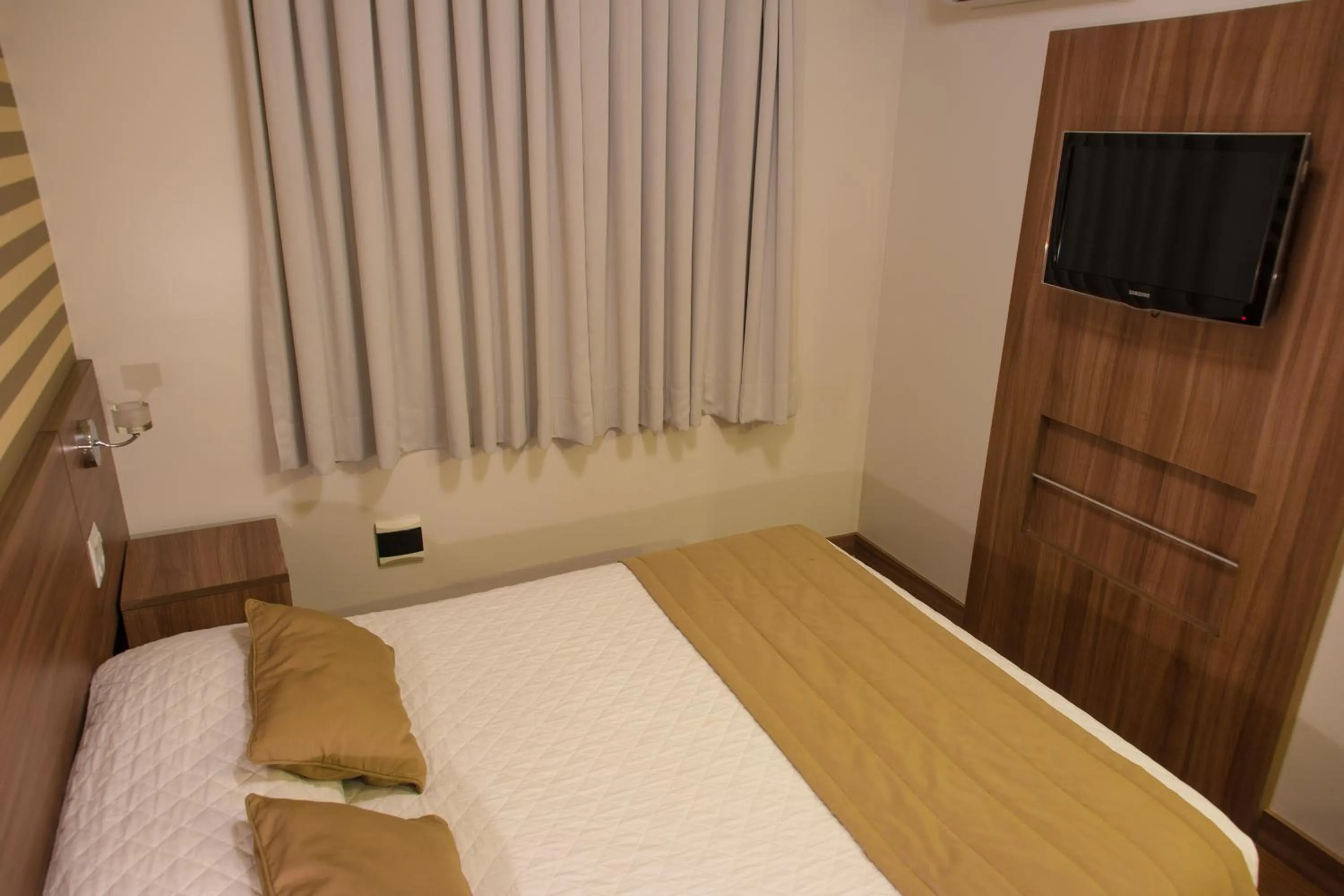 Photo of the whole room, Bed in Hotel Continental Business - 200 metros do Complexo Hospitalar Santa Casa