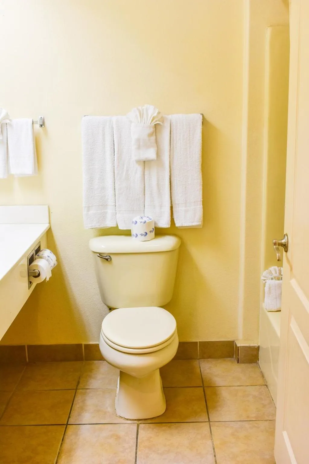 Toilet in Casa Bella Hotel and Suites