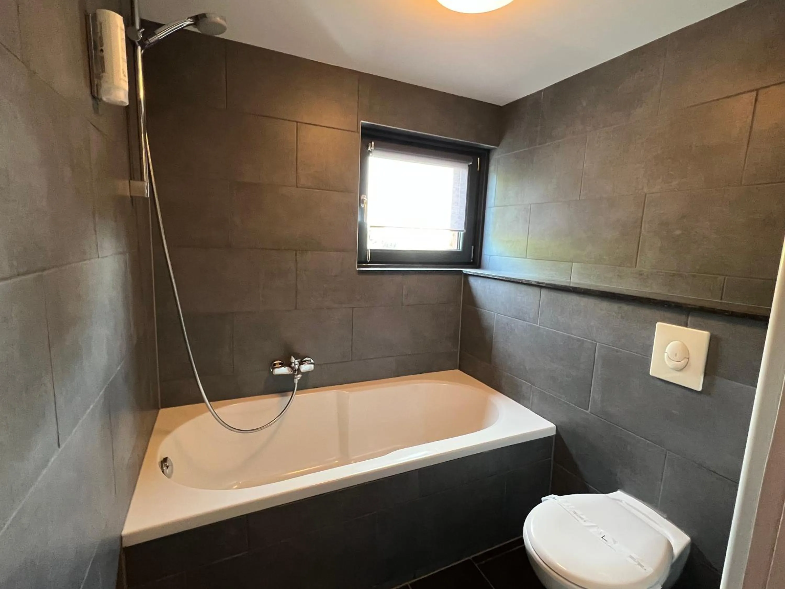 Bathroom in Hôtel Restaurant Lamy