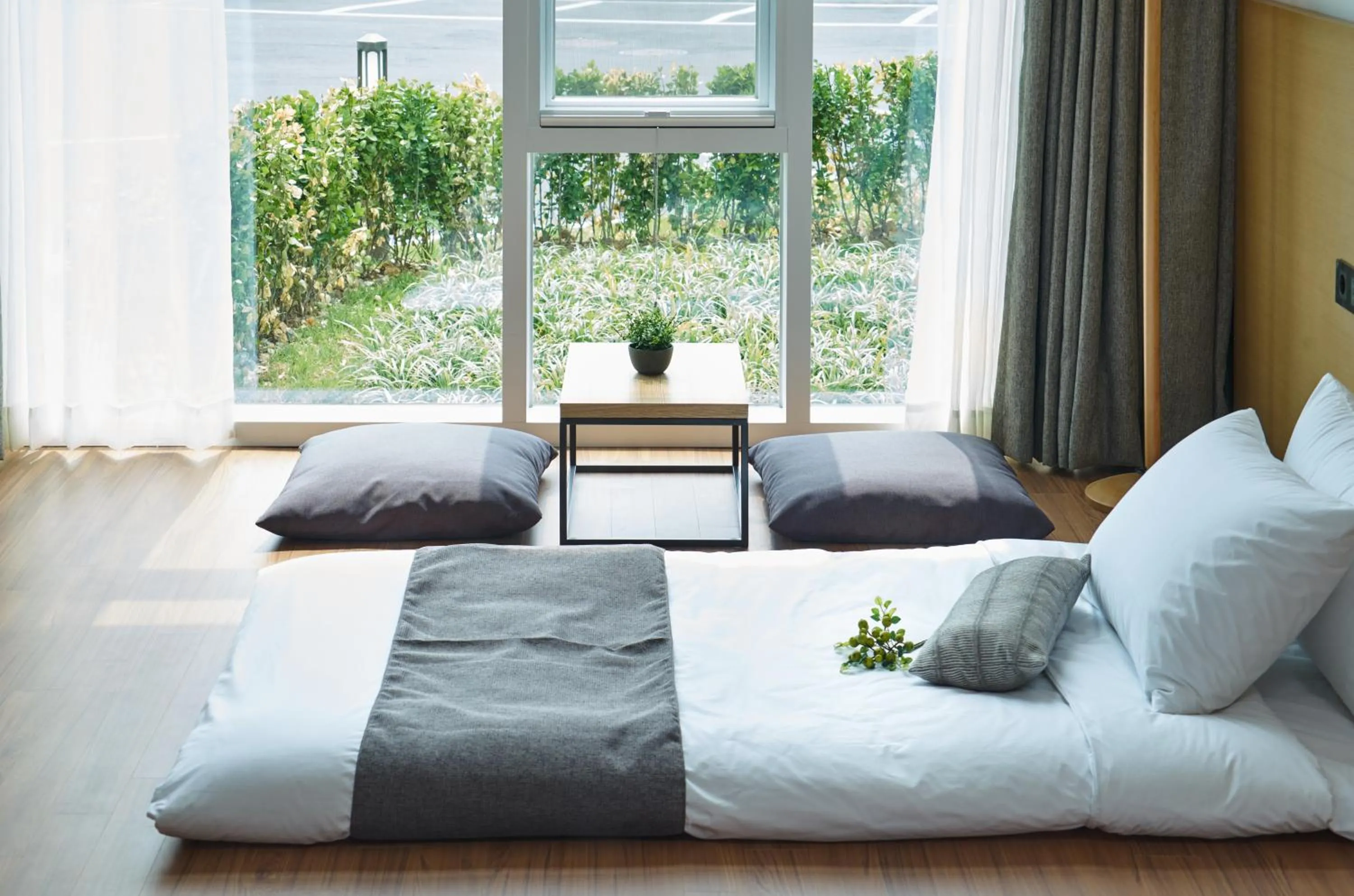 Bed in Naksan Beach Hotel