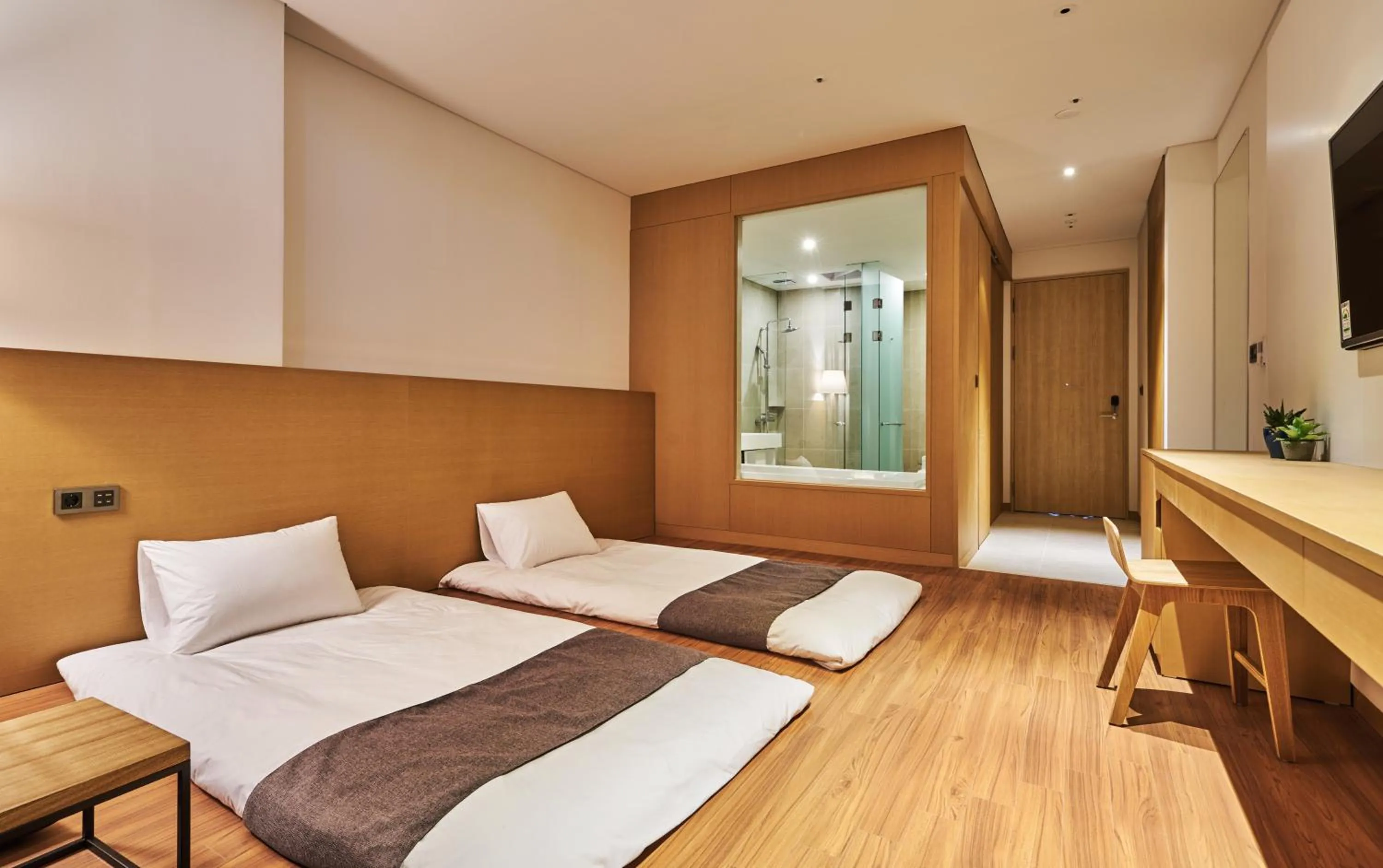 Bed in Naksan Beach Hotel