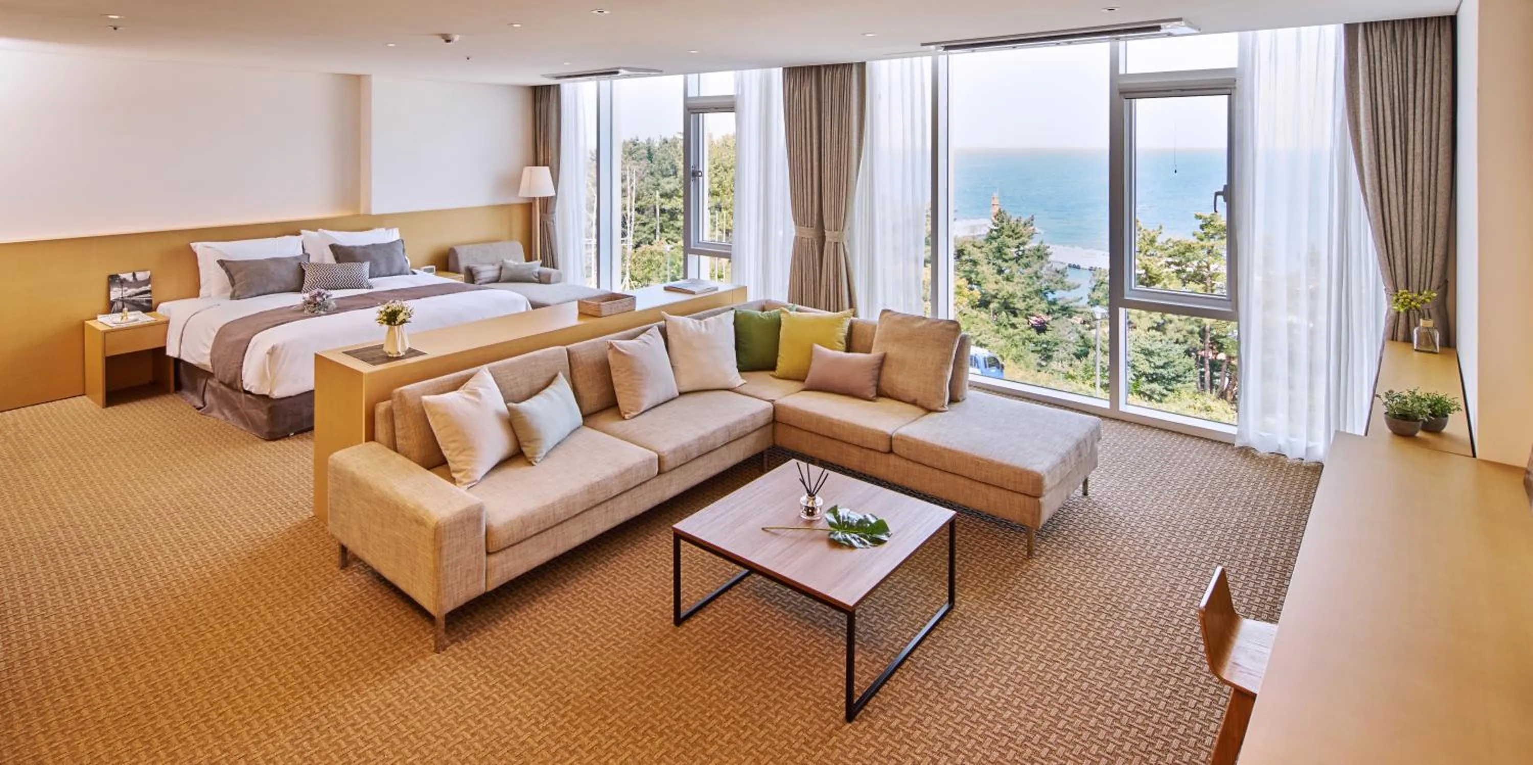 Living room, Bed in Naksan Beach Hotel