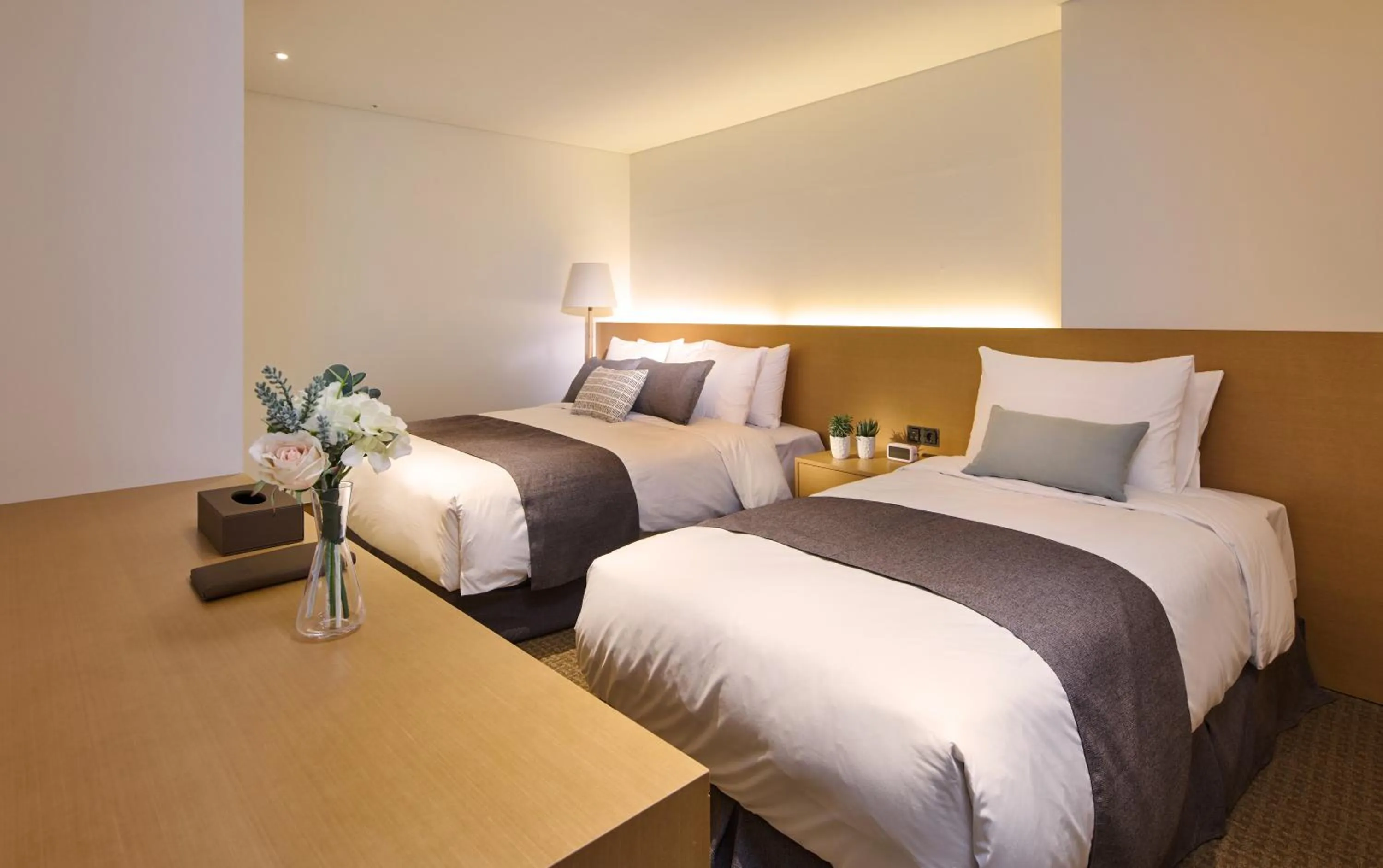 Bed in Naksan Beach Hotel