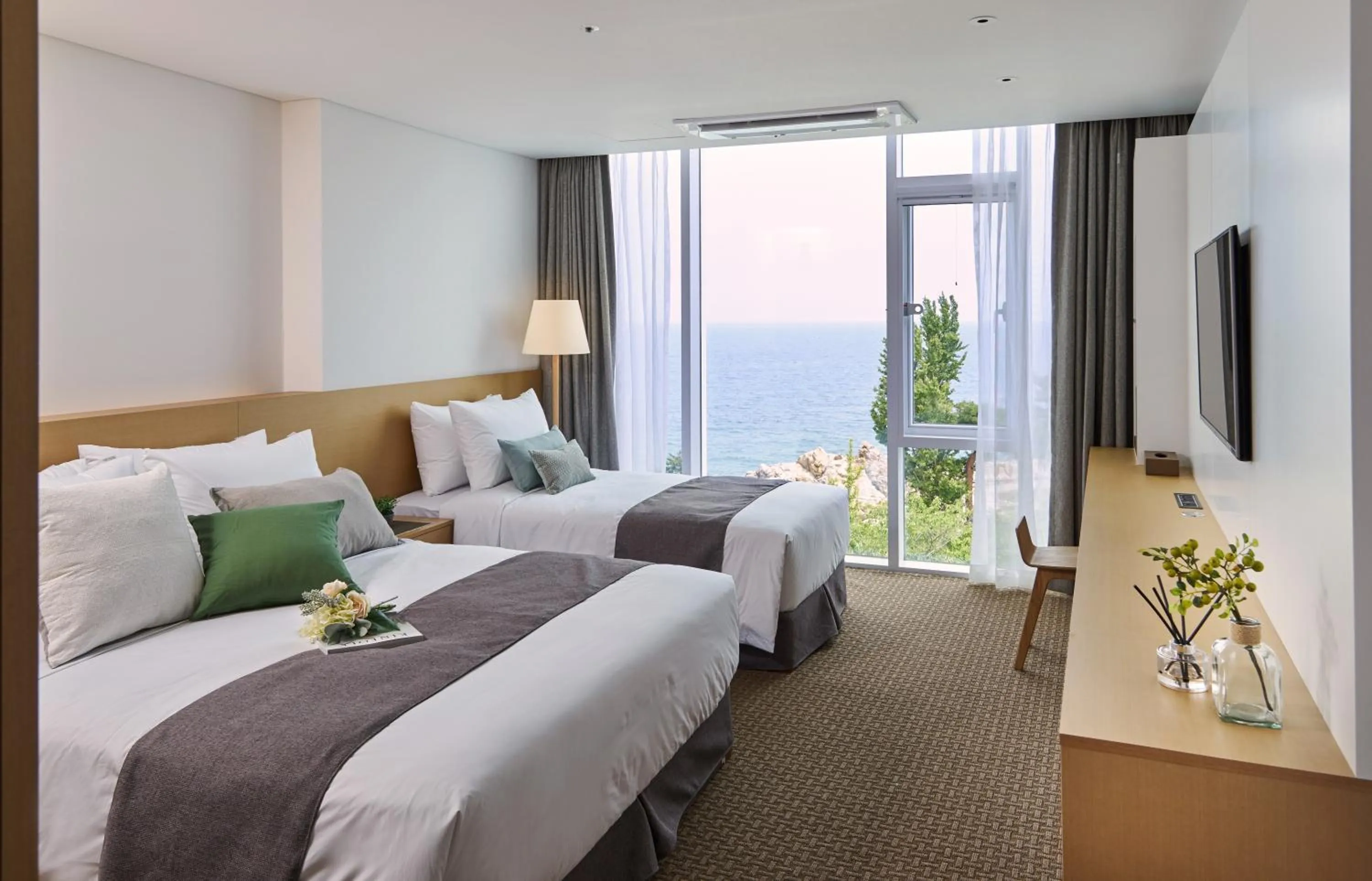 Bed in Naksan Beach Hotel