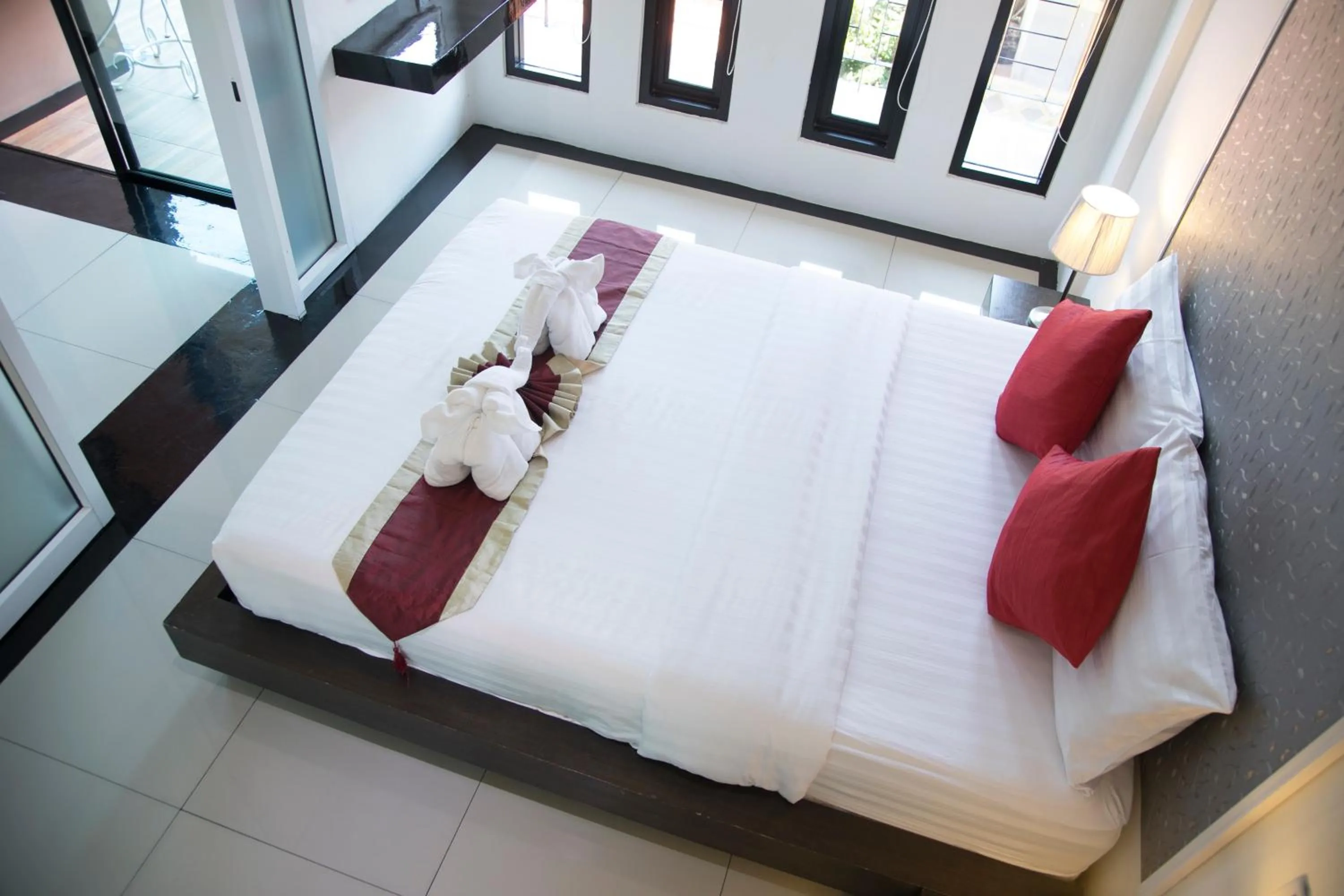 Photo of the whole room, Bed in West Key Kamala Apartment