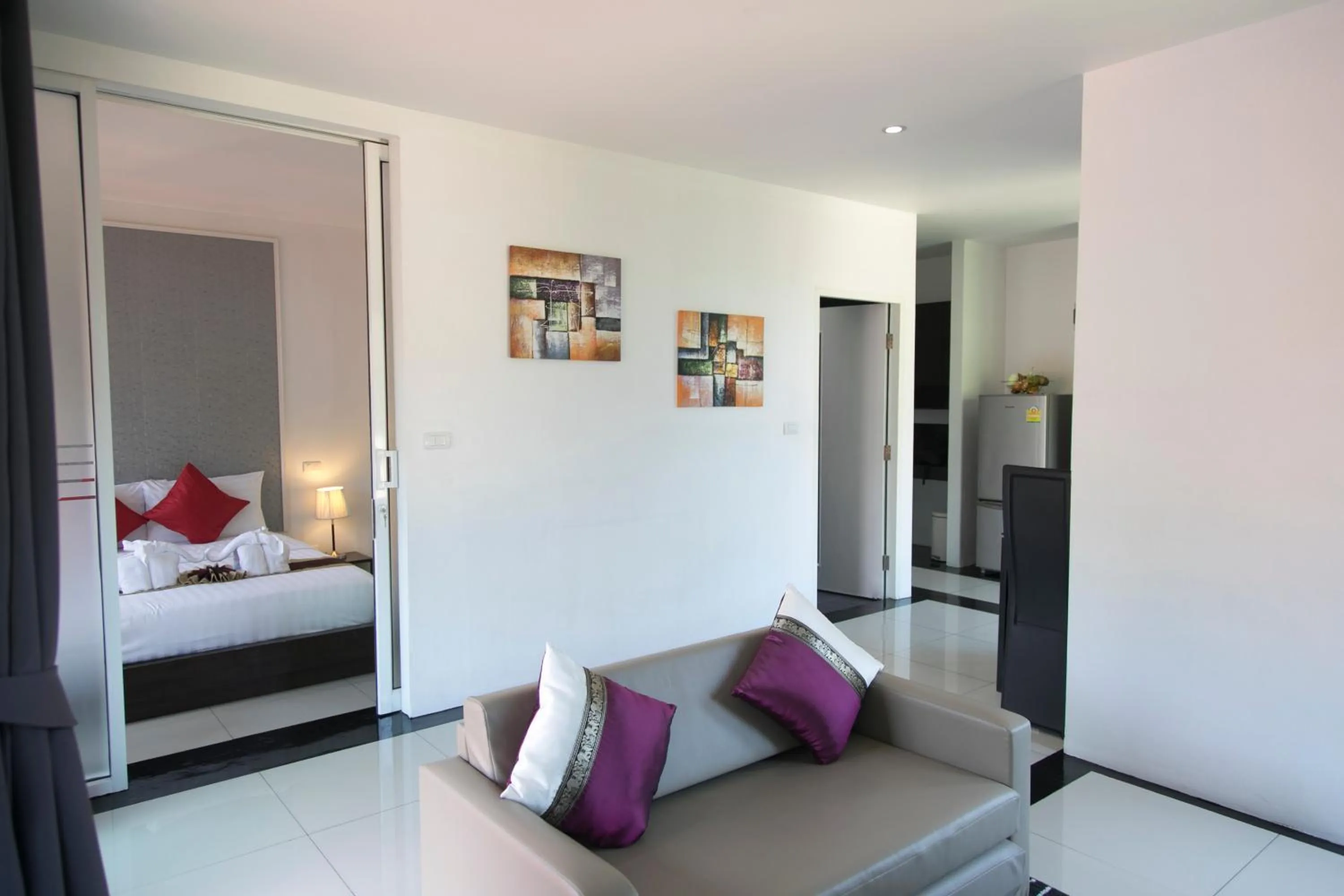 Living room, Bed in West Key Kamala Apartment