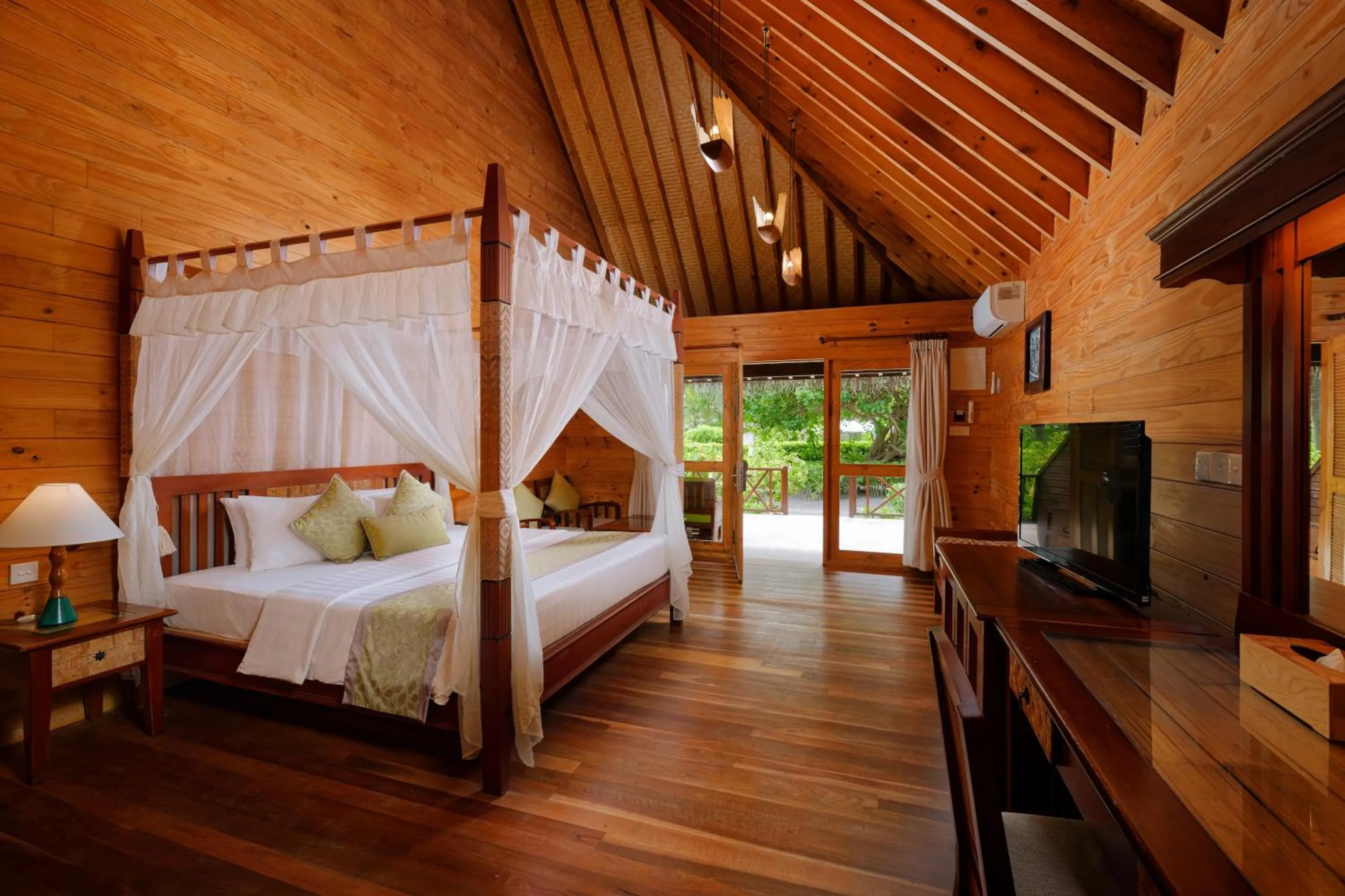 Bed in Bandos Maldives