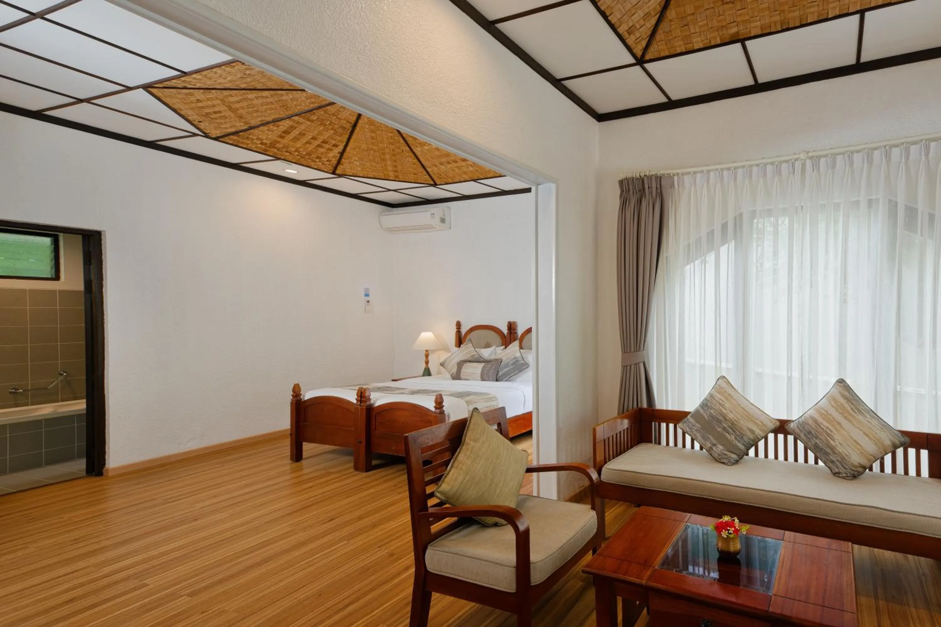 Living room, Bed in Bandos Maldives