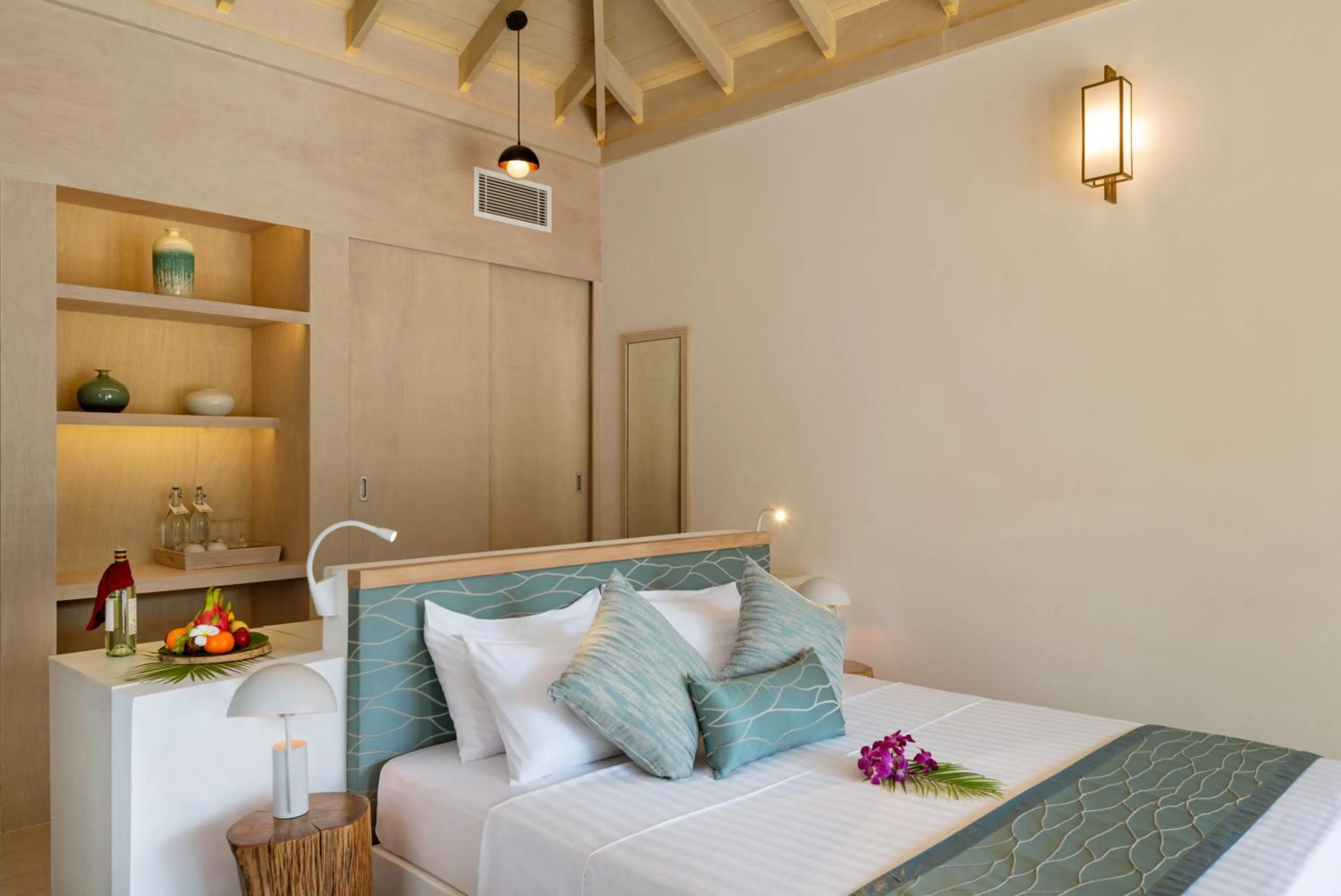 Bed in Bandos Maldives