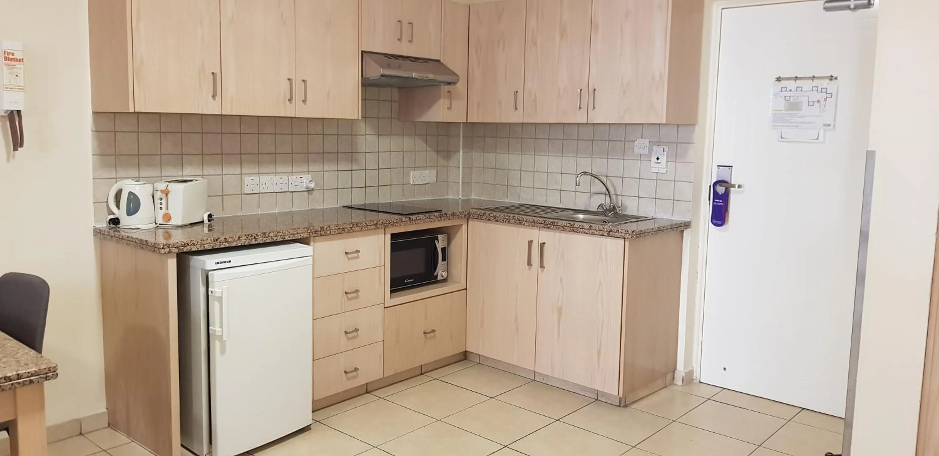 Kitchen or kitchenette in Senator Hotel Apartments - Adults Only