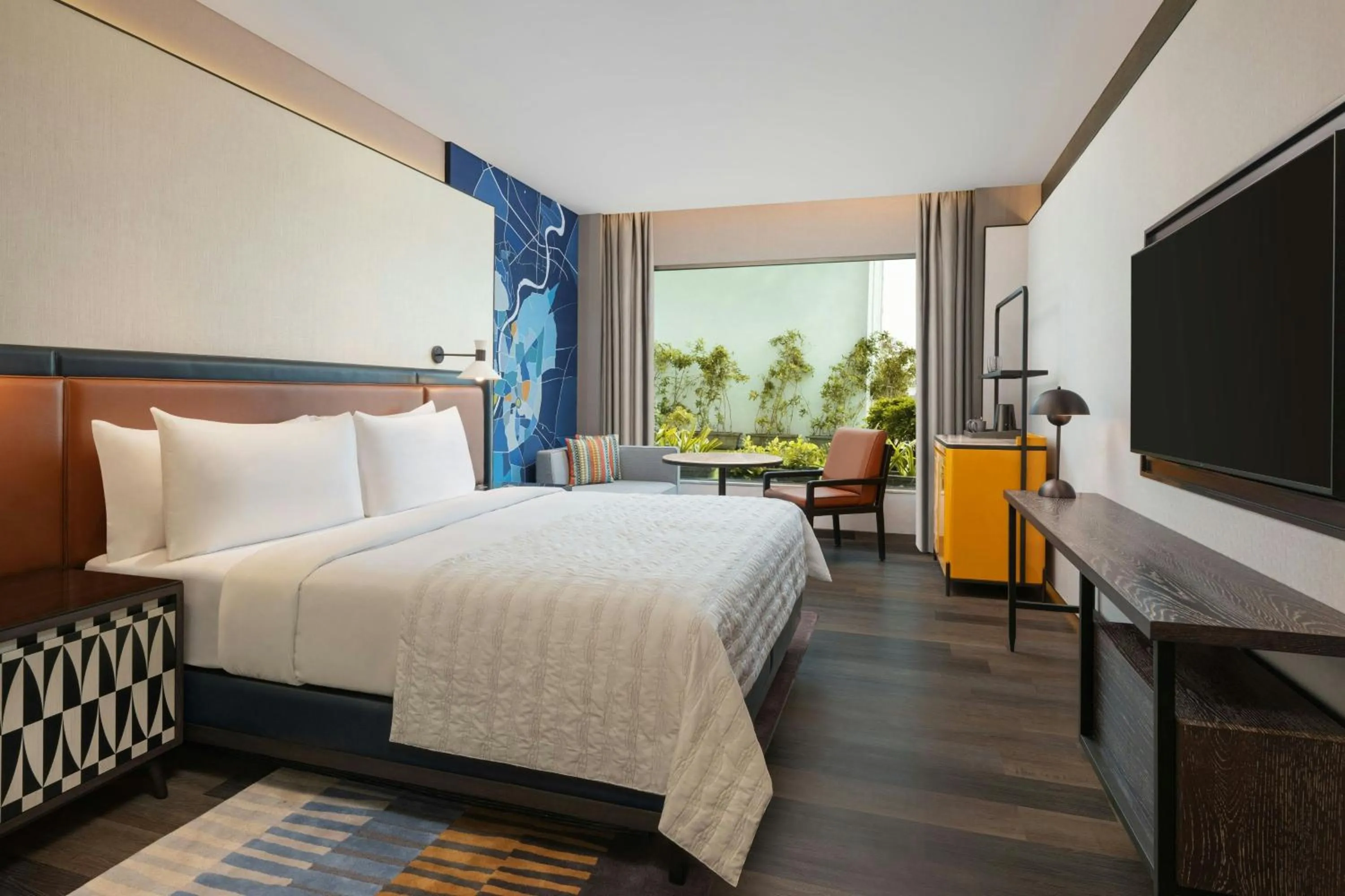 Photo of the whole room, Bed in Le Meridien Ahmedabad