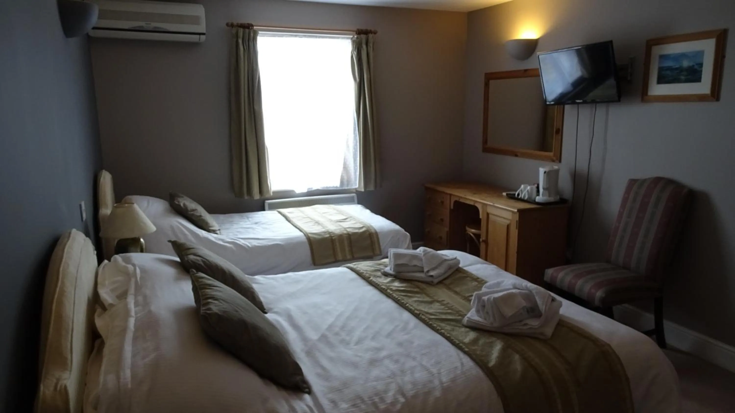 Bed in The Furze Bush Inn