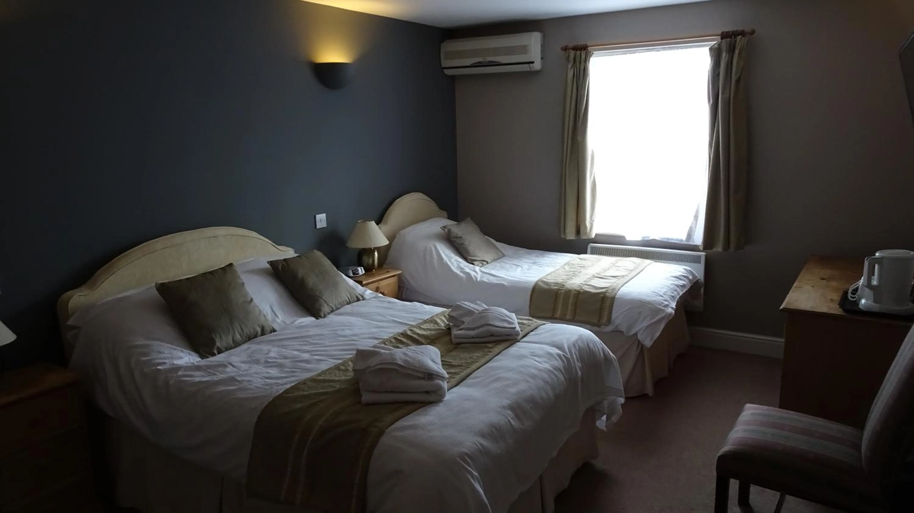 Bed in The Furze Bush Inn