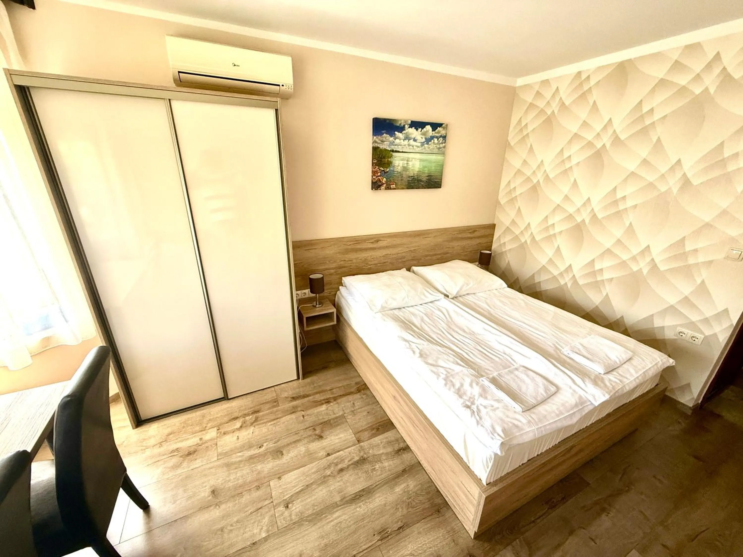 Photo of the whole room, Bed in See Vendégház - Siófok