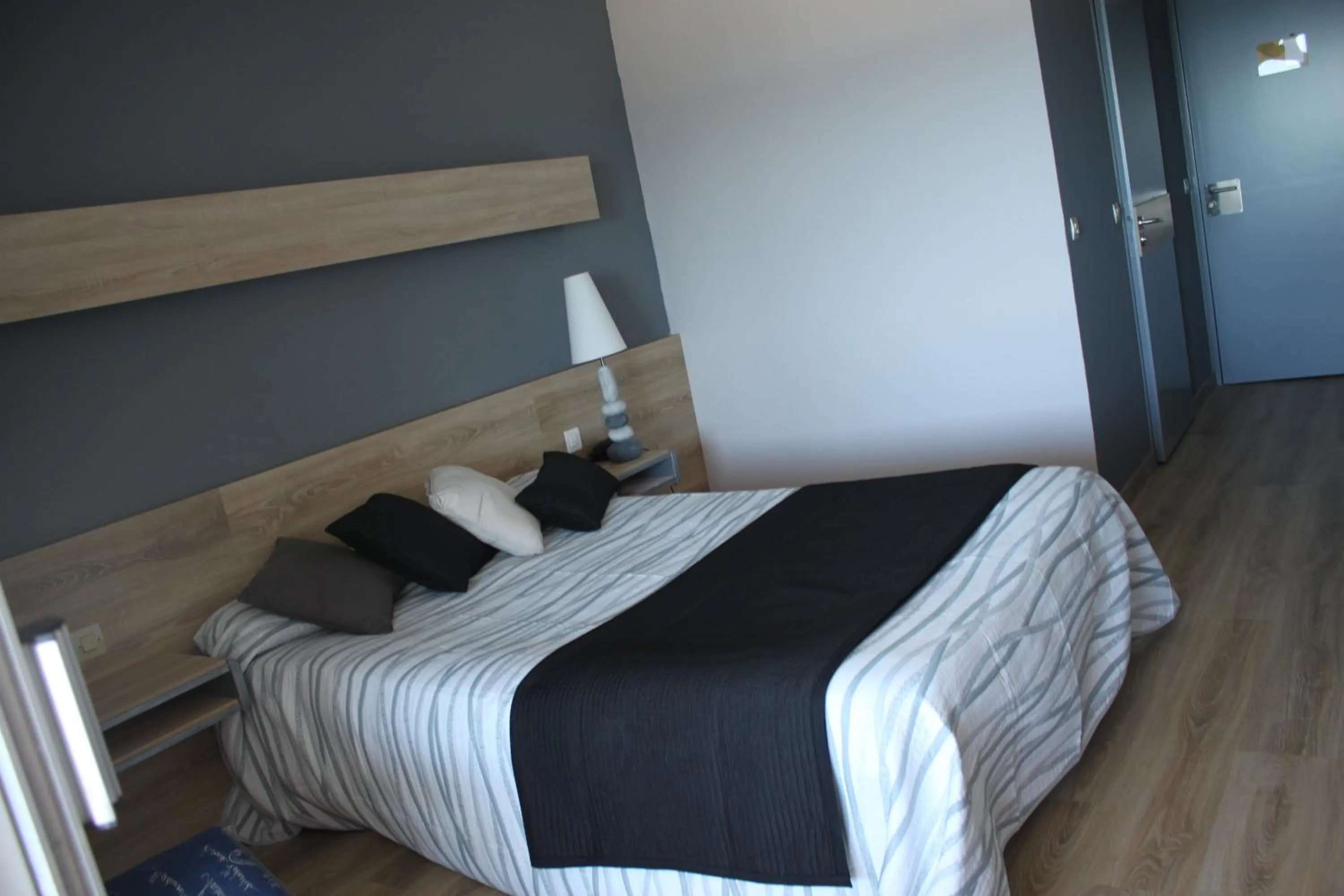 Bed in Logis Hotel Solhotel