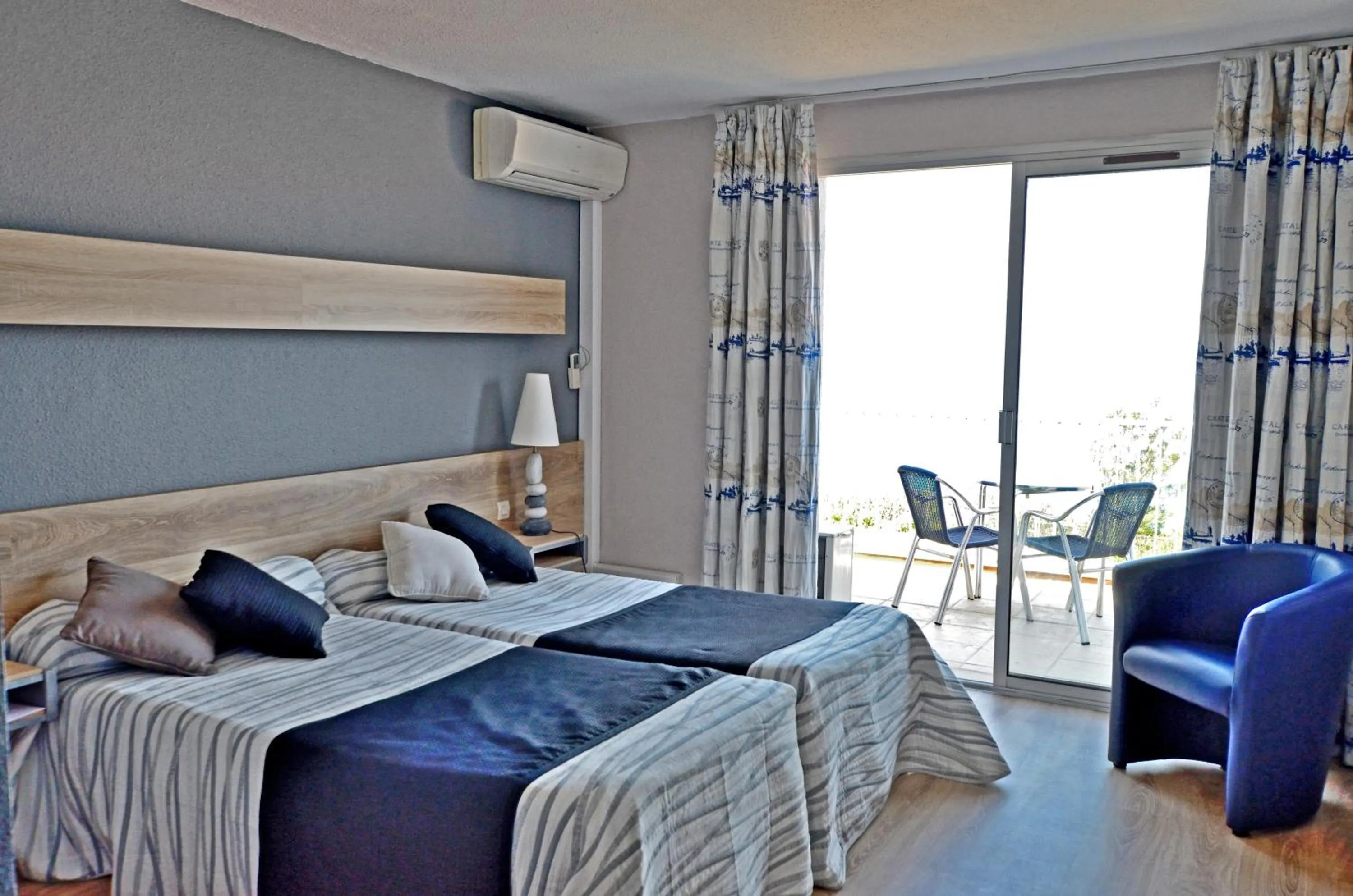 Bedroom in Logis Hotel Solhotel