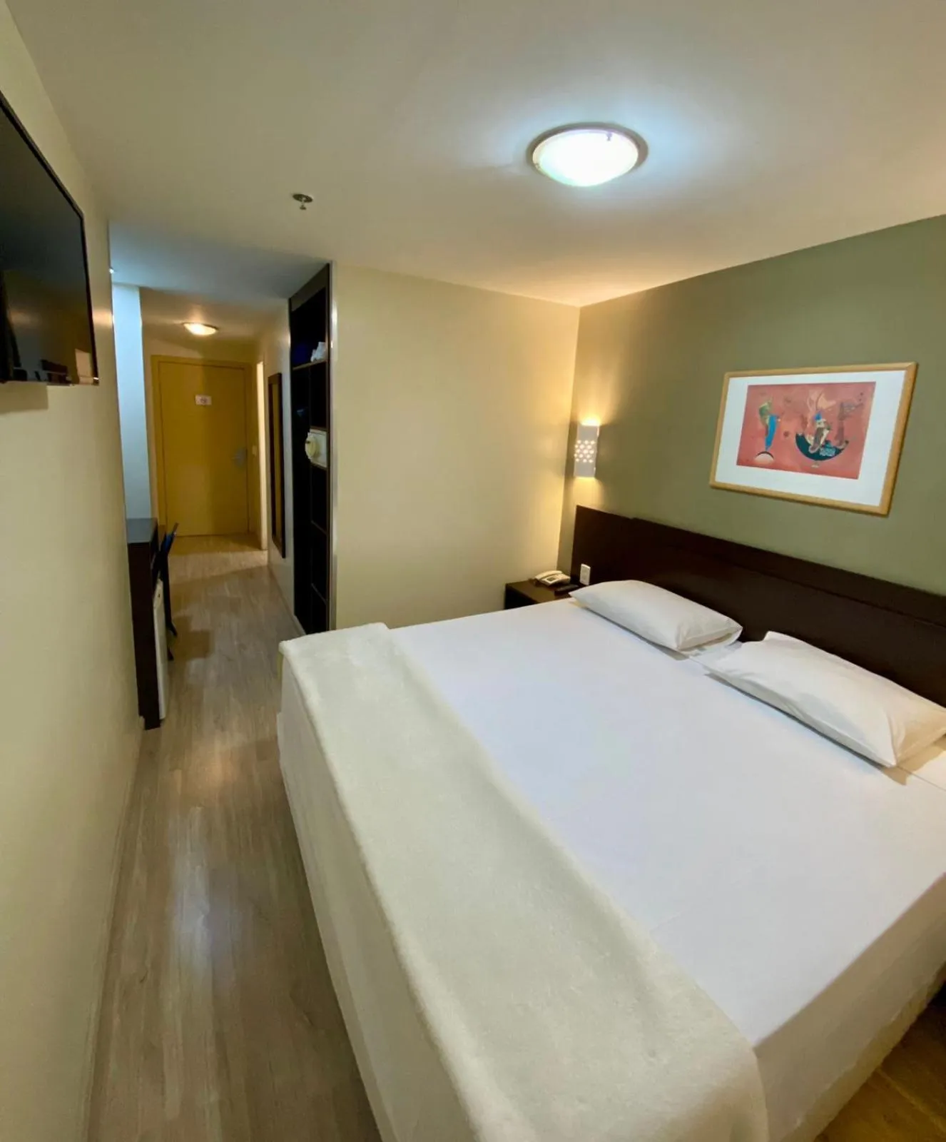 Bed in Coral Trade Hotel