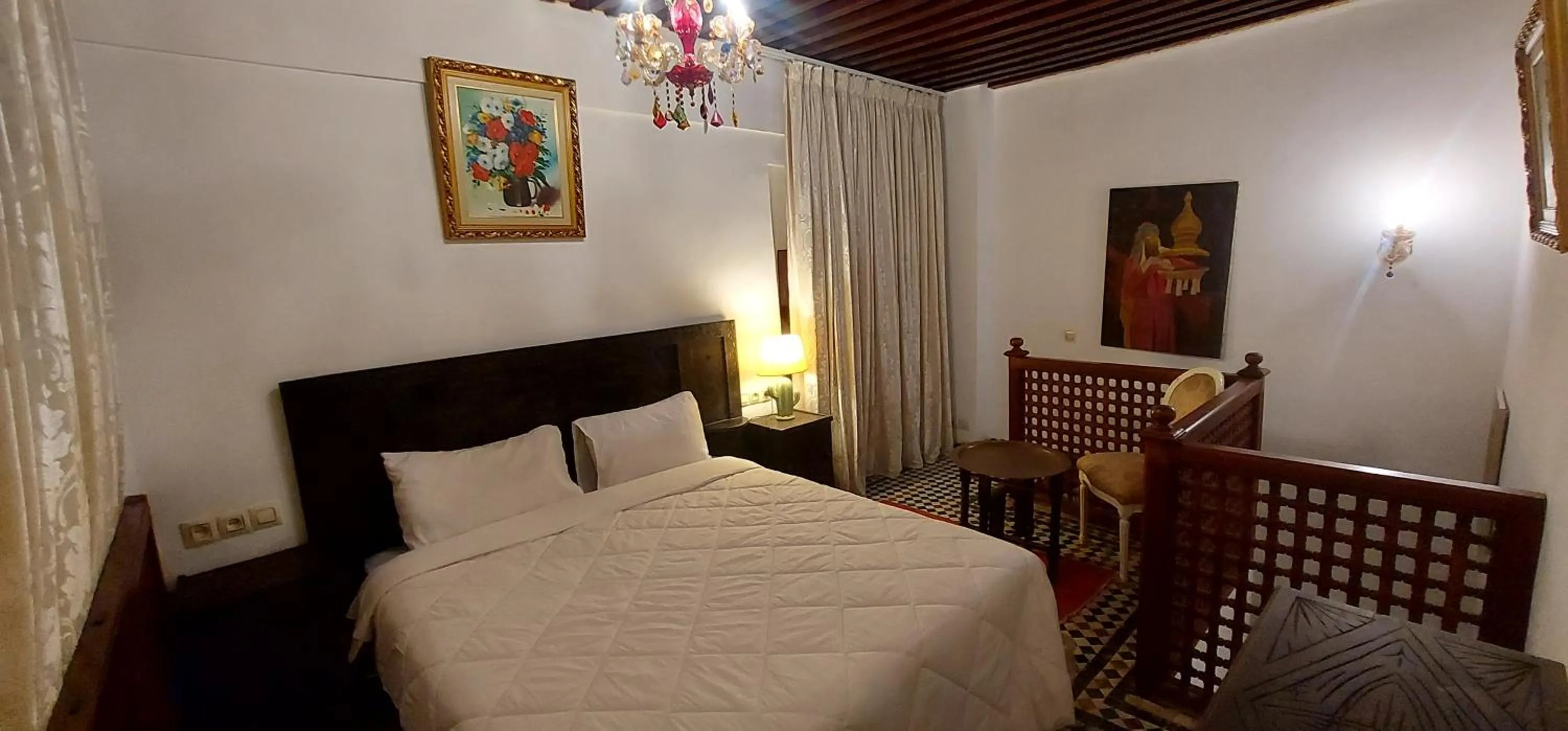 Seating area, Bed in Palais AL Firdaous