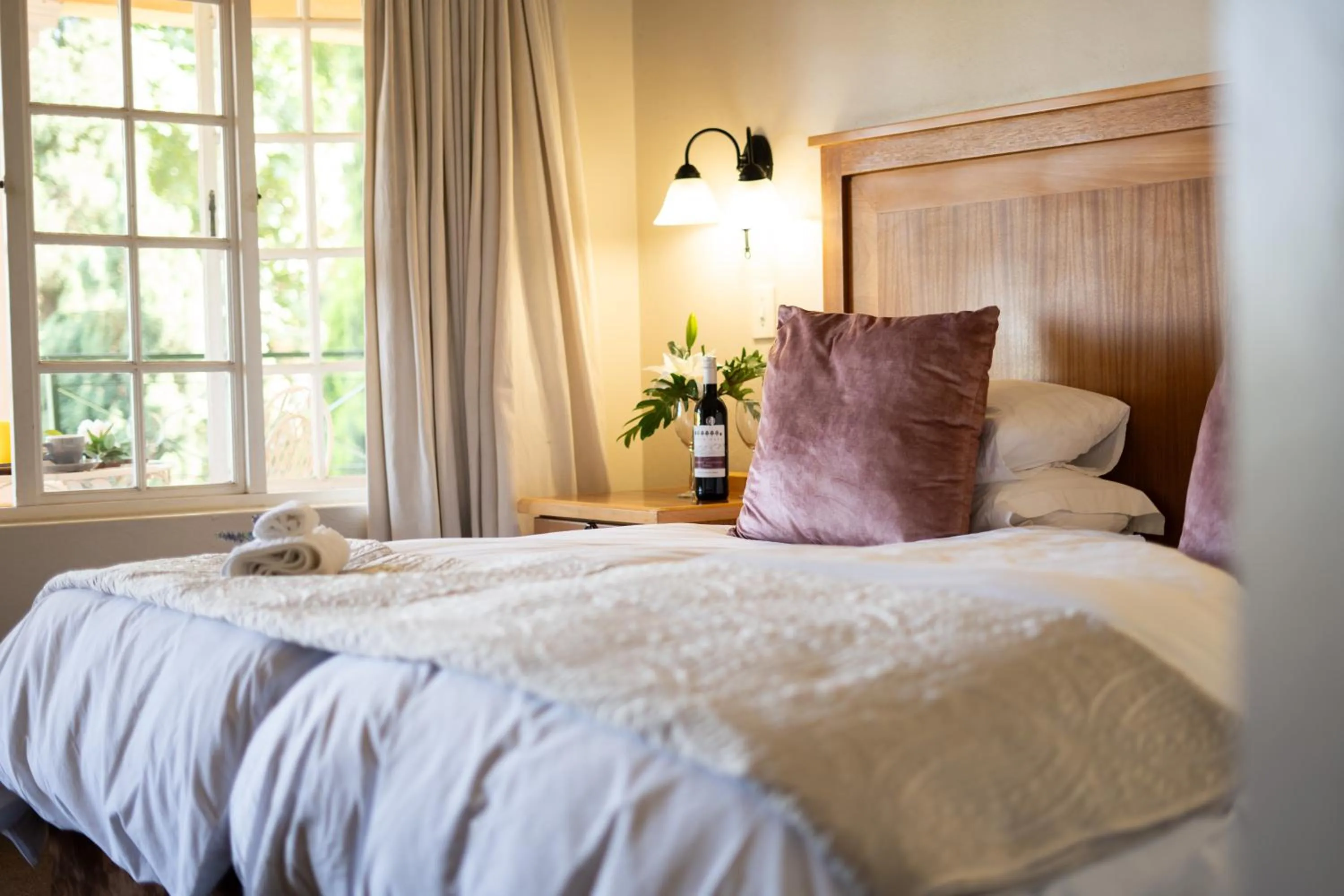 Bed in Little Tuscany Boutique Hotel