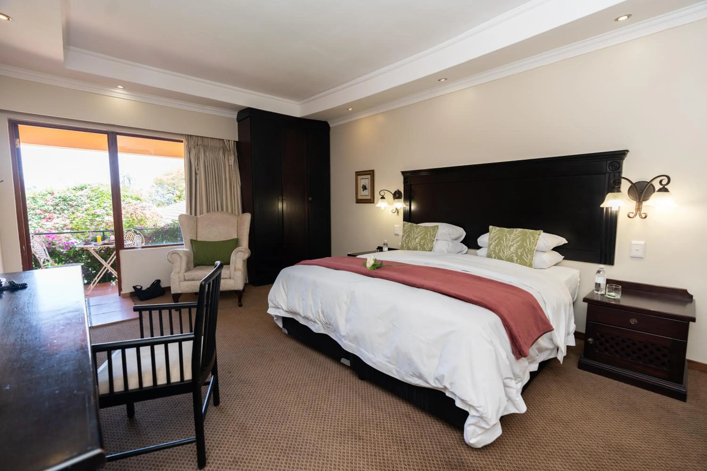 Bed in Little Tuscany Boutique Hotel