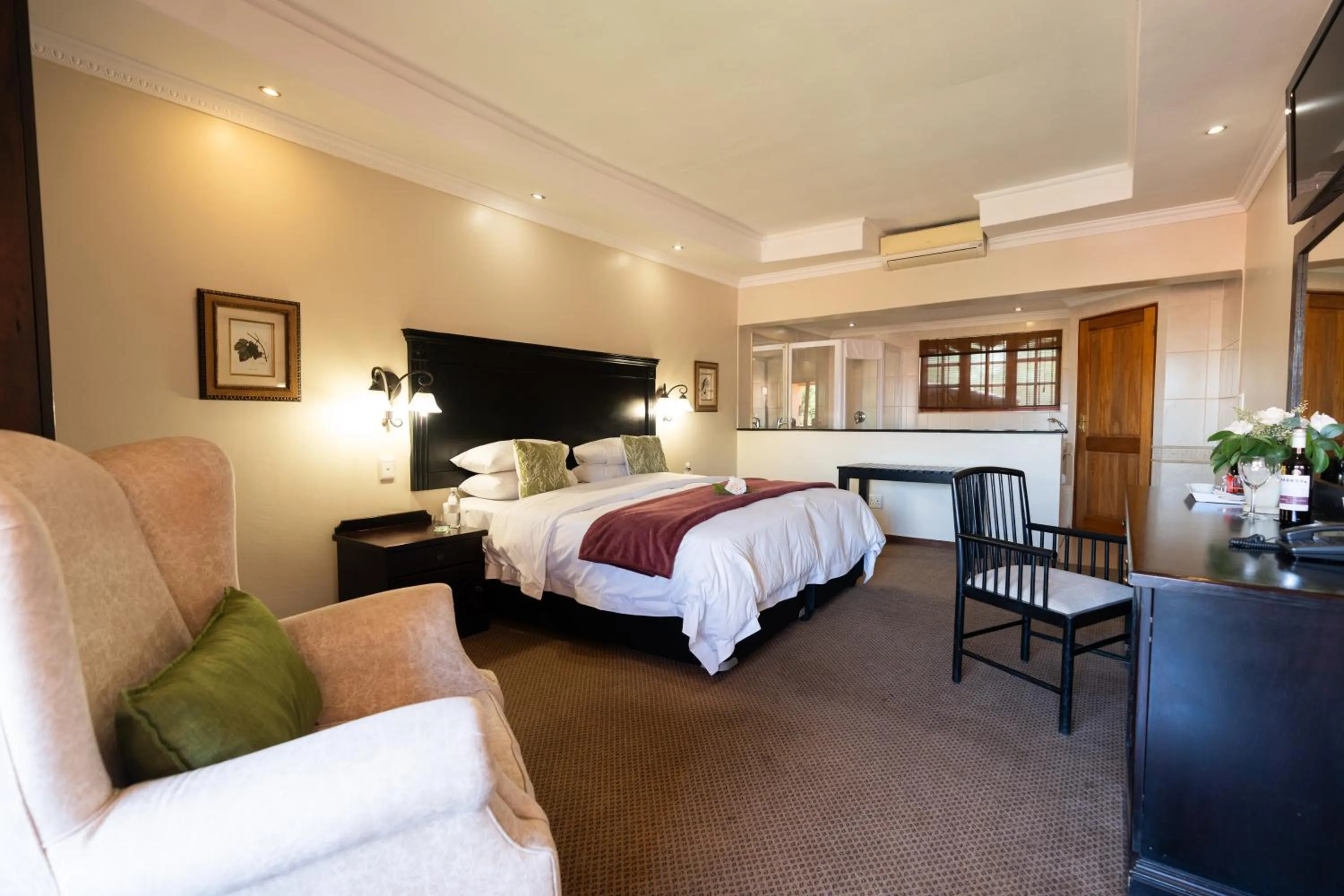 Bed in Little Tuscany Boutique Hotel