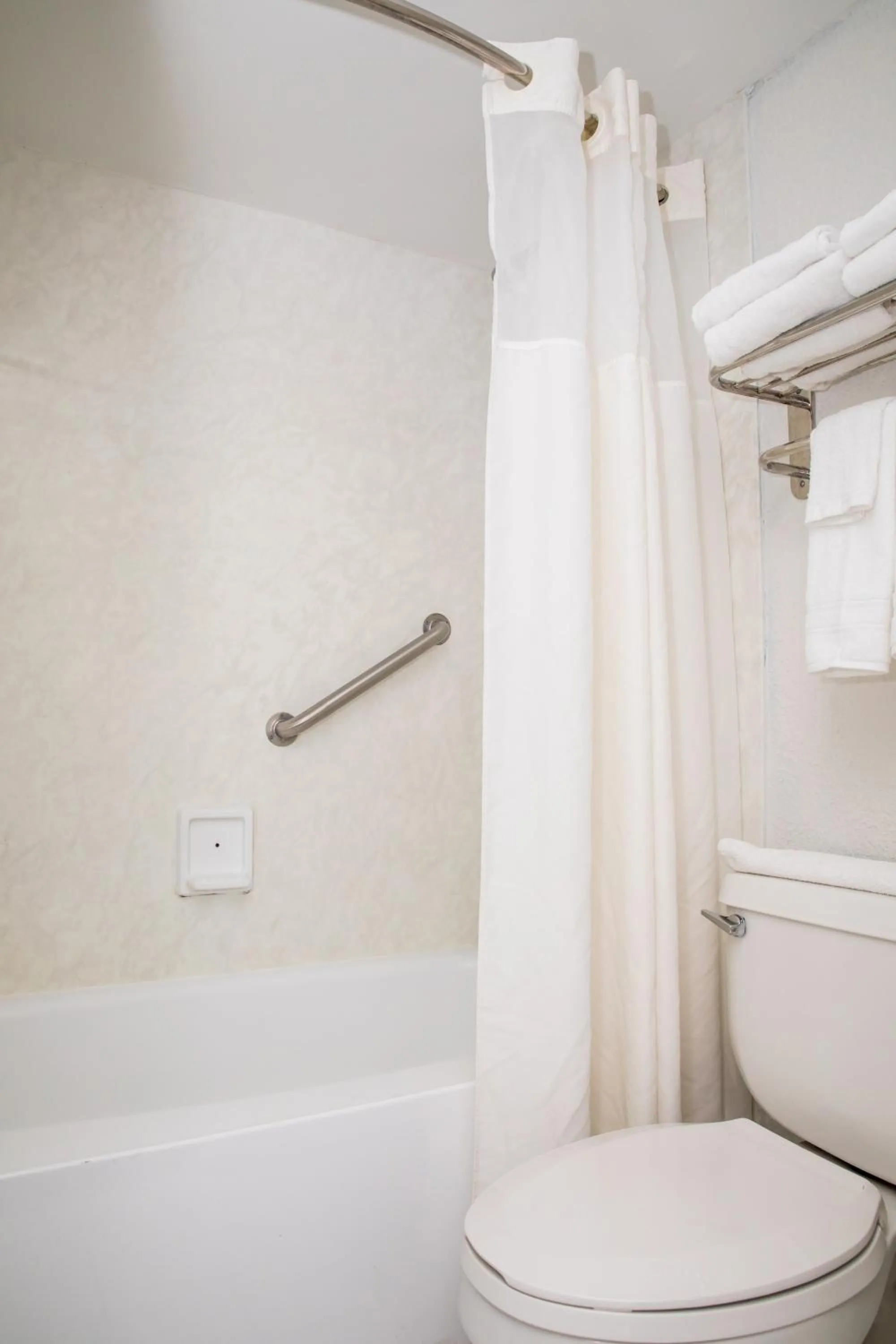 Shower in Days Inn by Wyndham Stuart