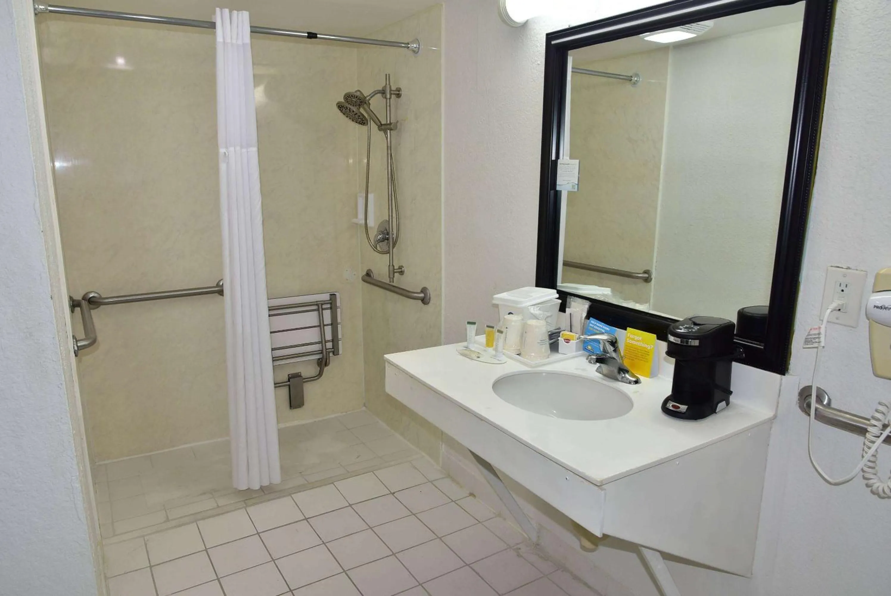 Bathroom in Days Inn by Wyndham Stuart