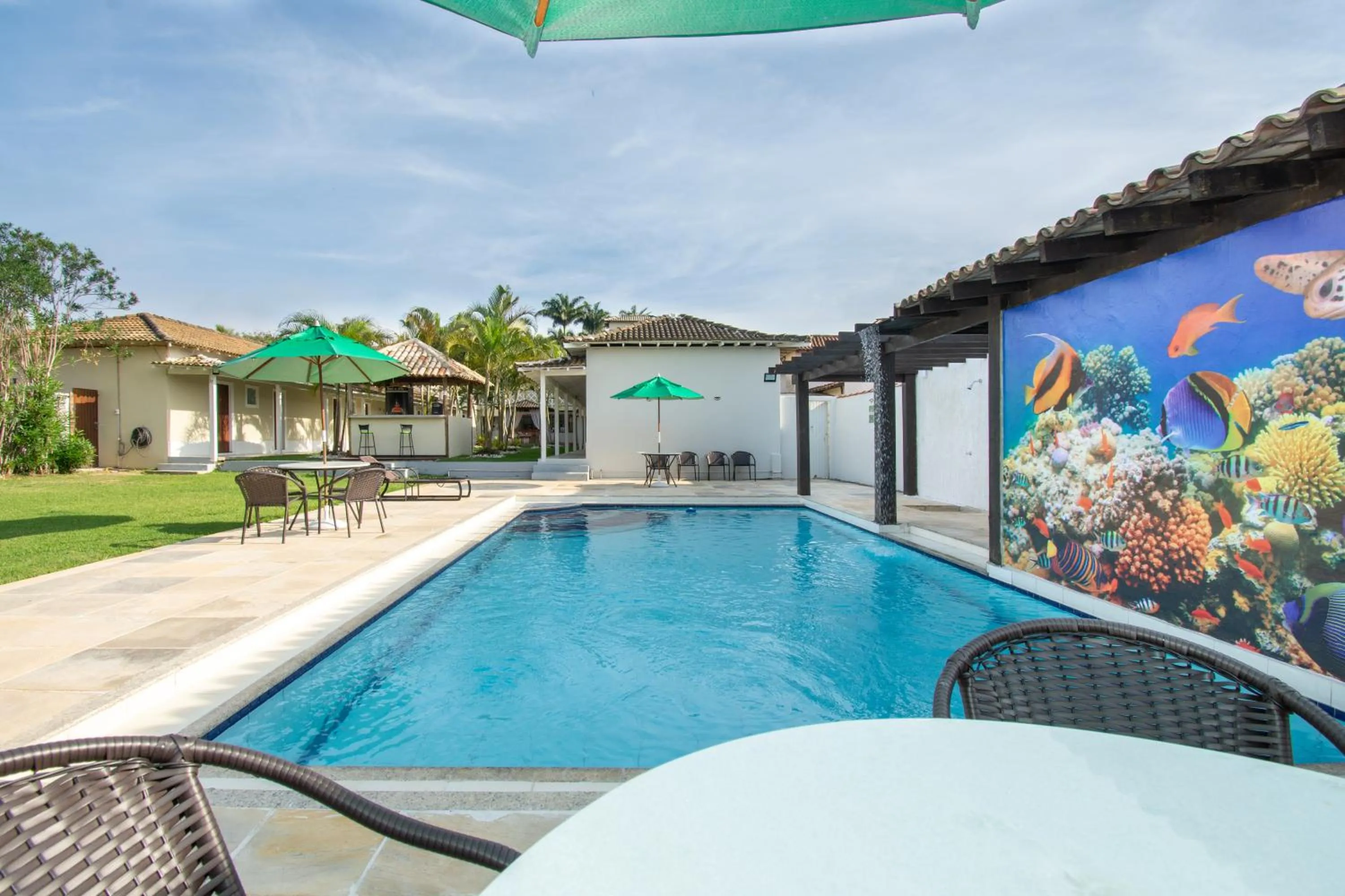 Swimming pool in Pousada Casuarina Ferradura