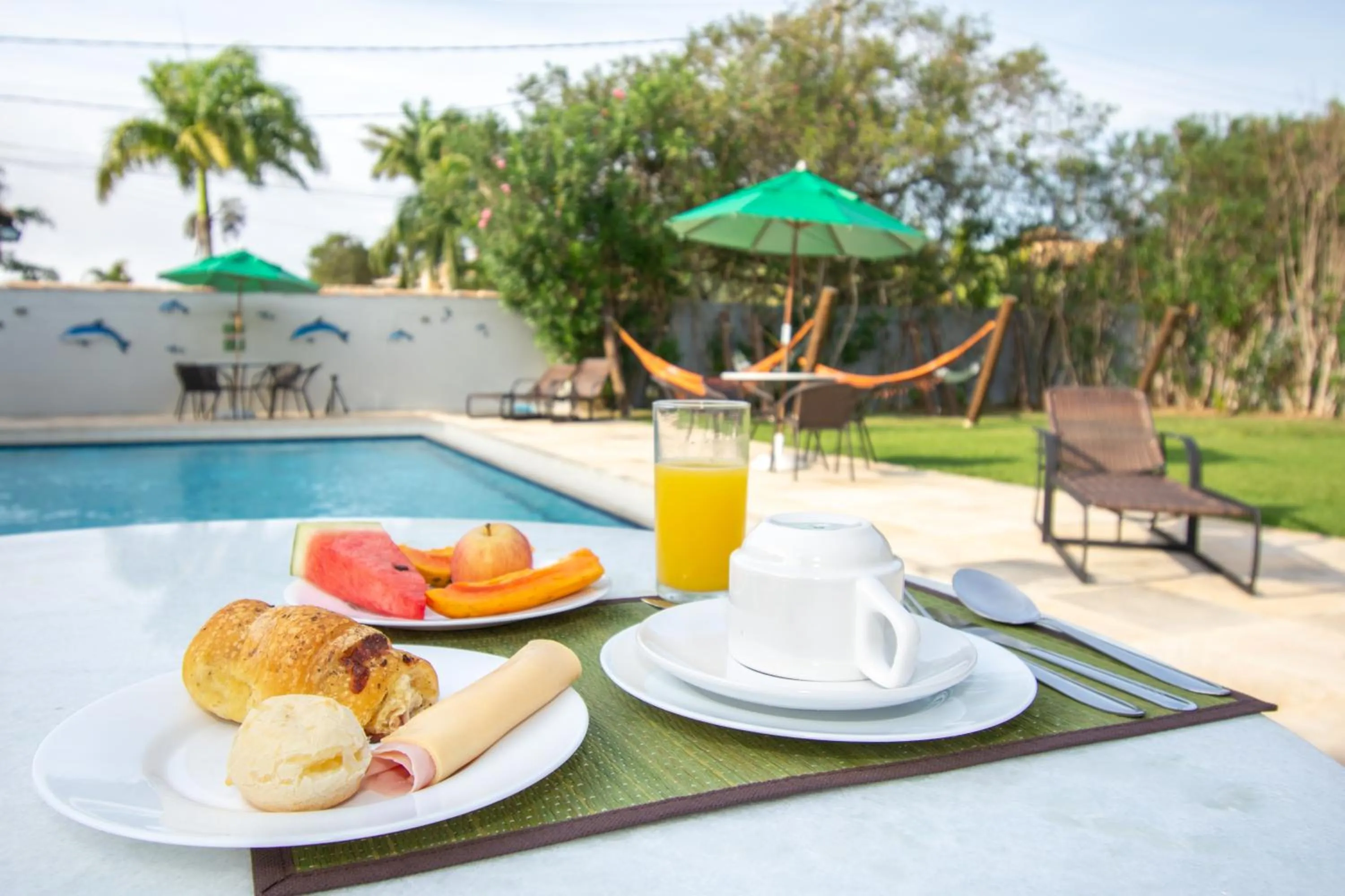 Swimming pool in Pousada Casuarina Ferradura