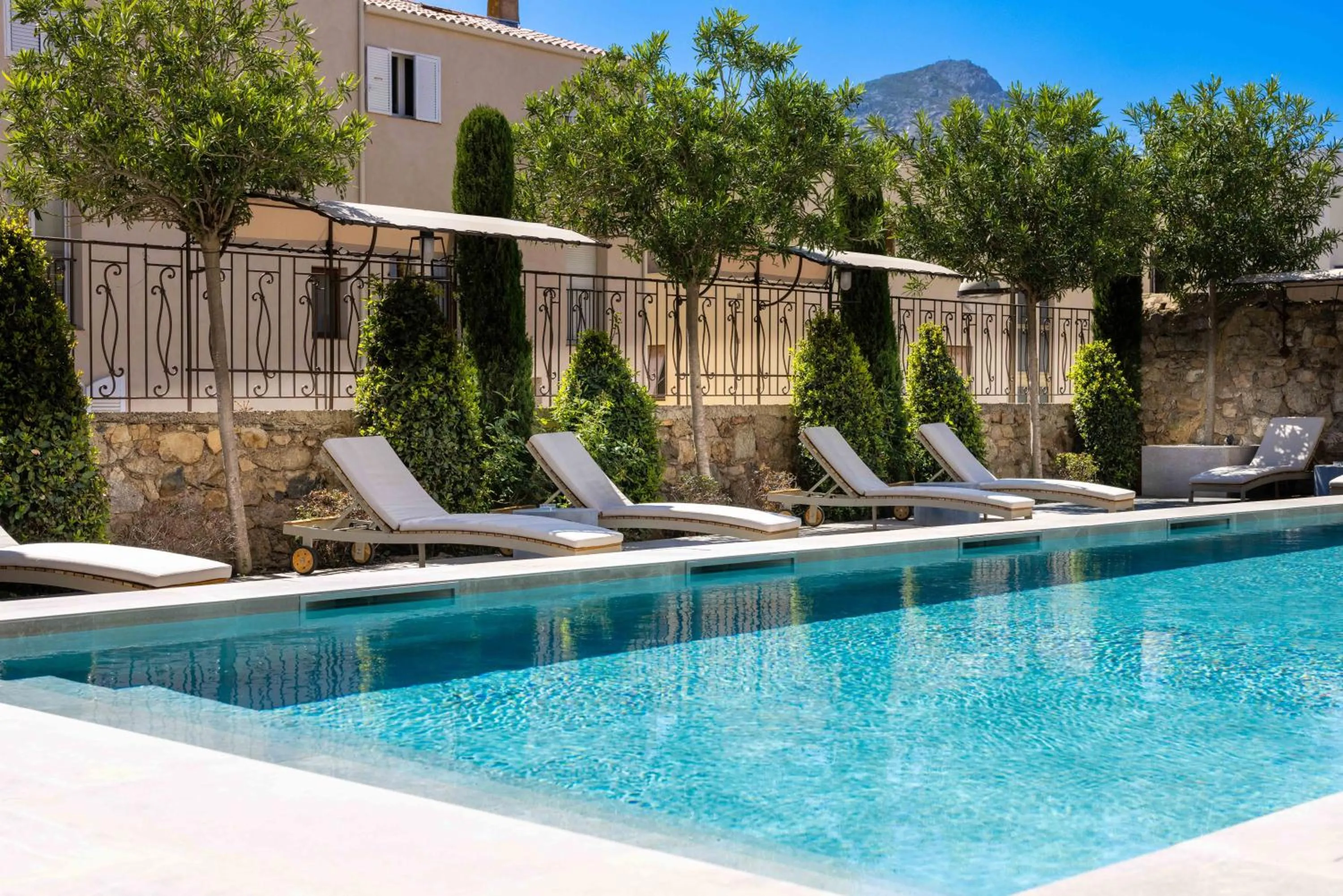 Swimming pool in Hôtel L'Abbaye