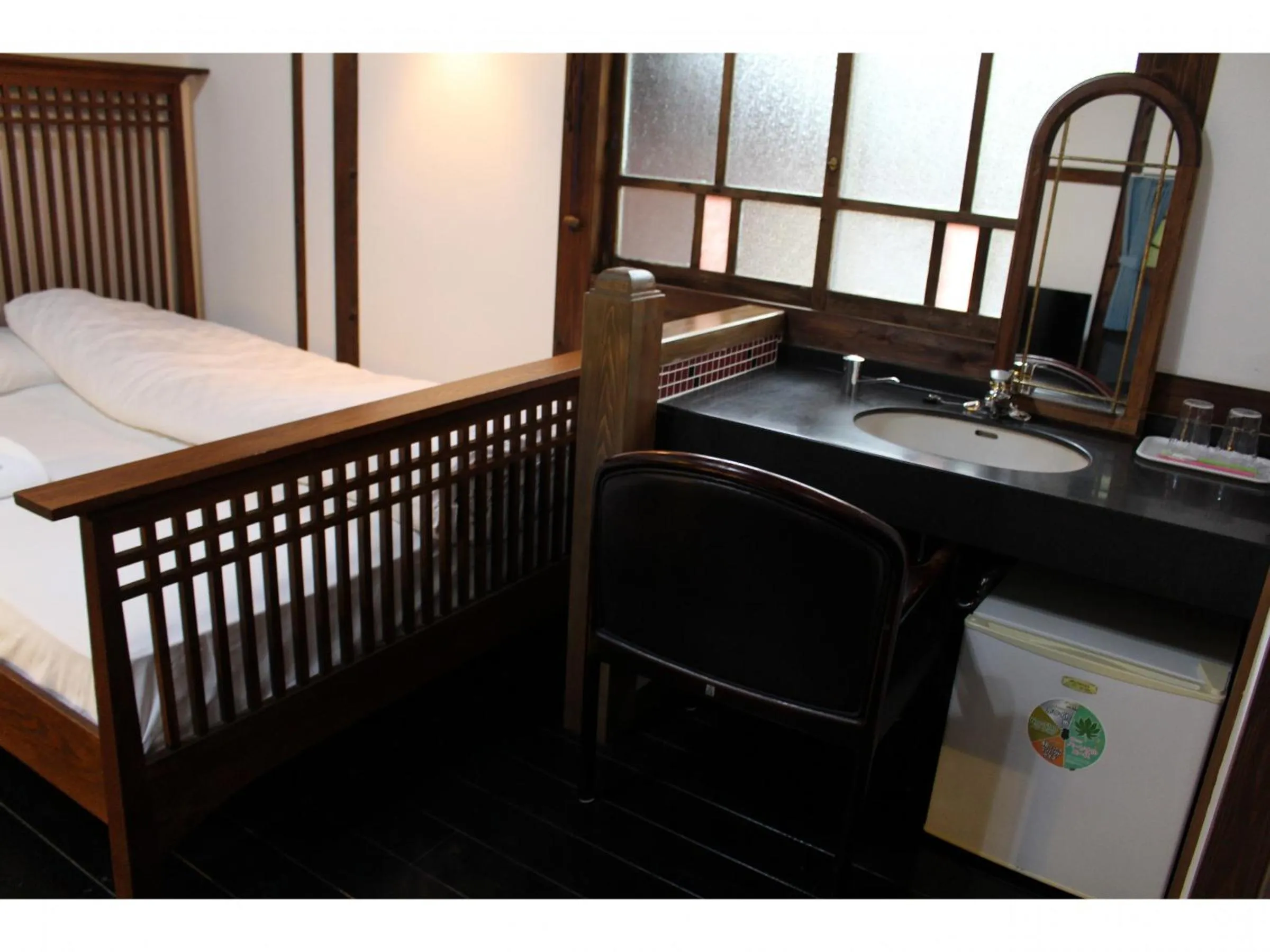 Bed in Kotohira Guest House en