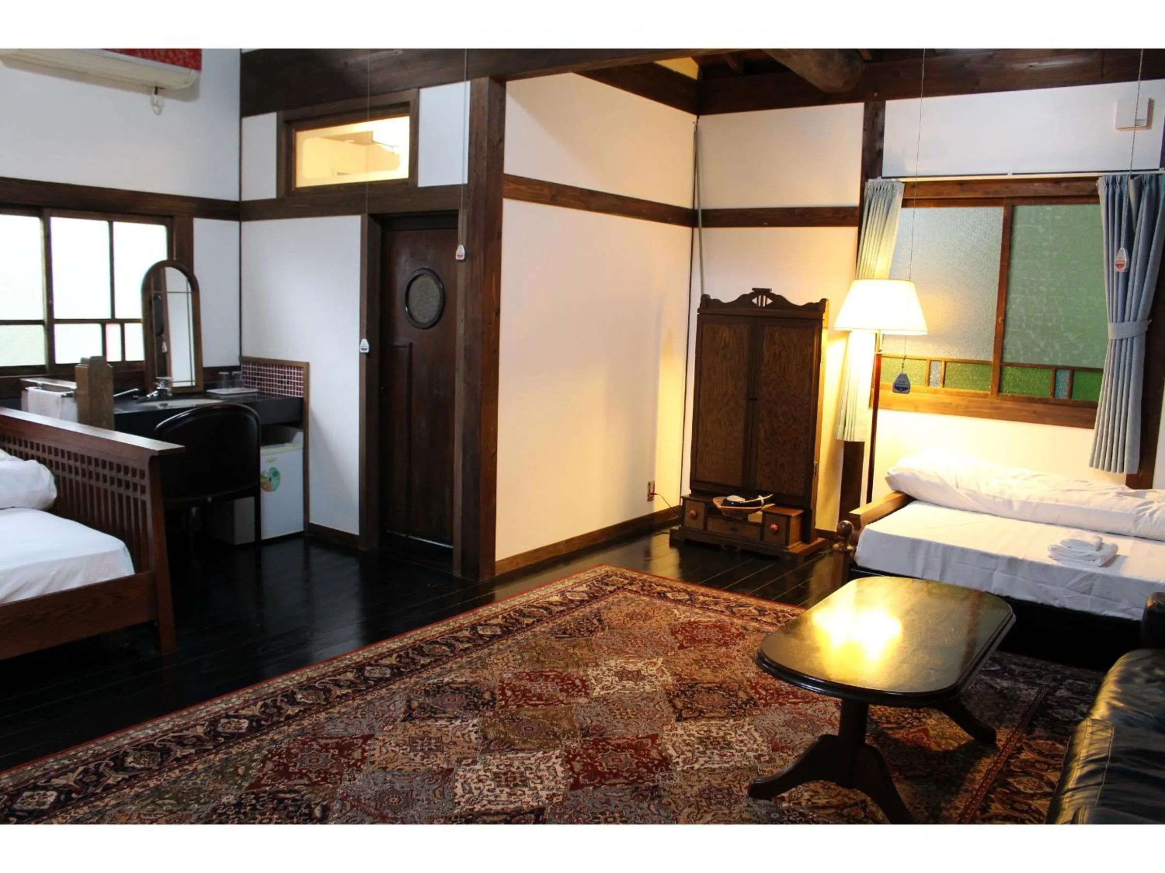 Bed in Kotohira Guest House en