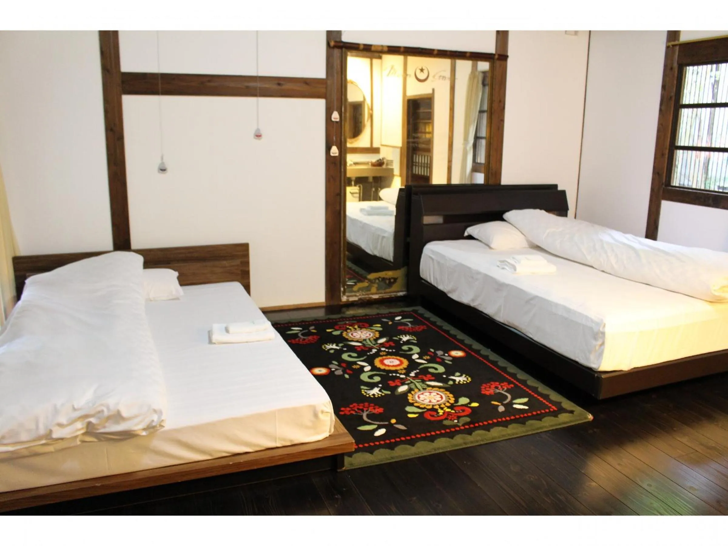 Bed in Kotohira Guest House en